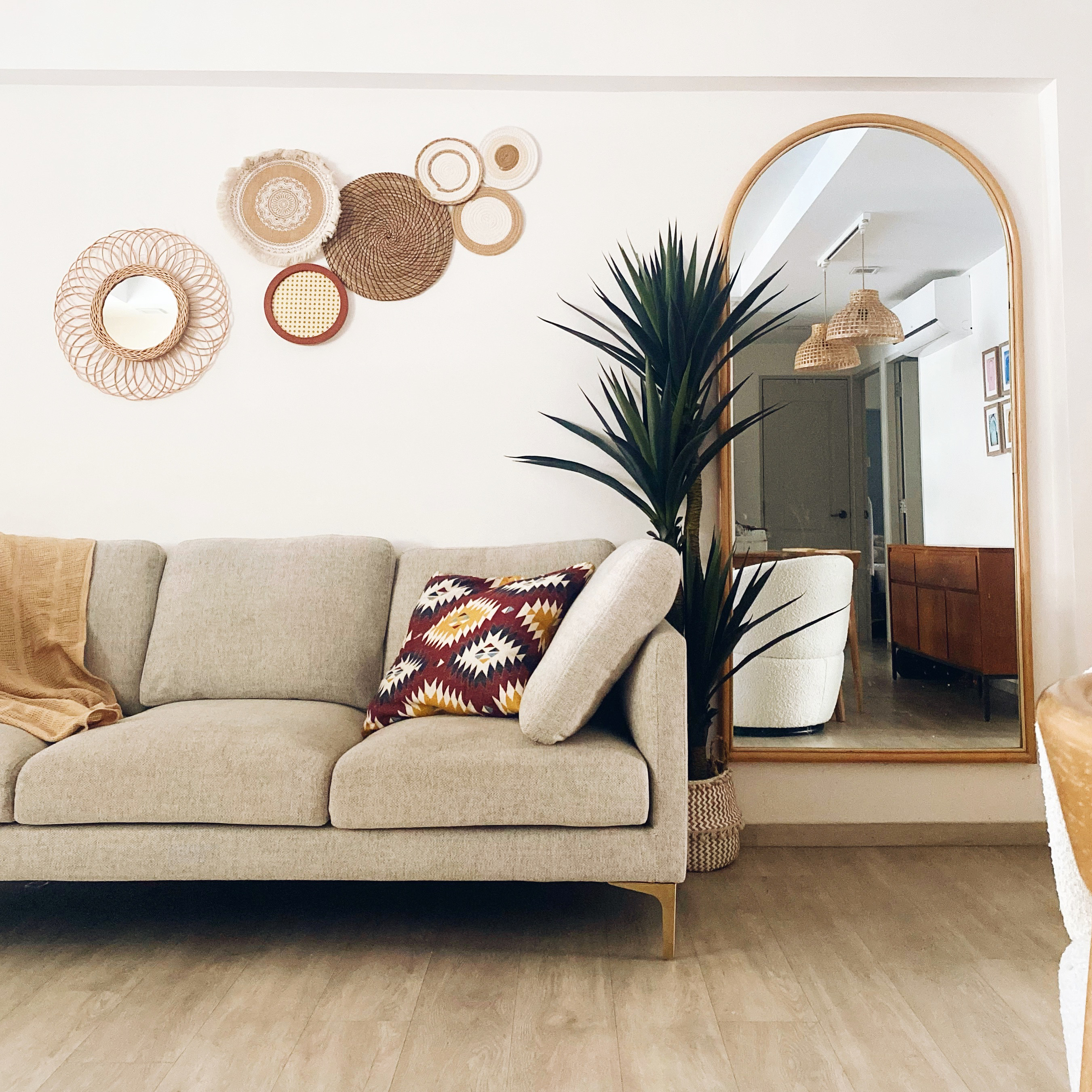 Warm & Cozy Living Room vibes - Modern living room, cozy seating, beige sofa, decorative pillows, woven wall art, large