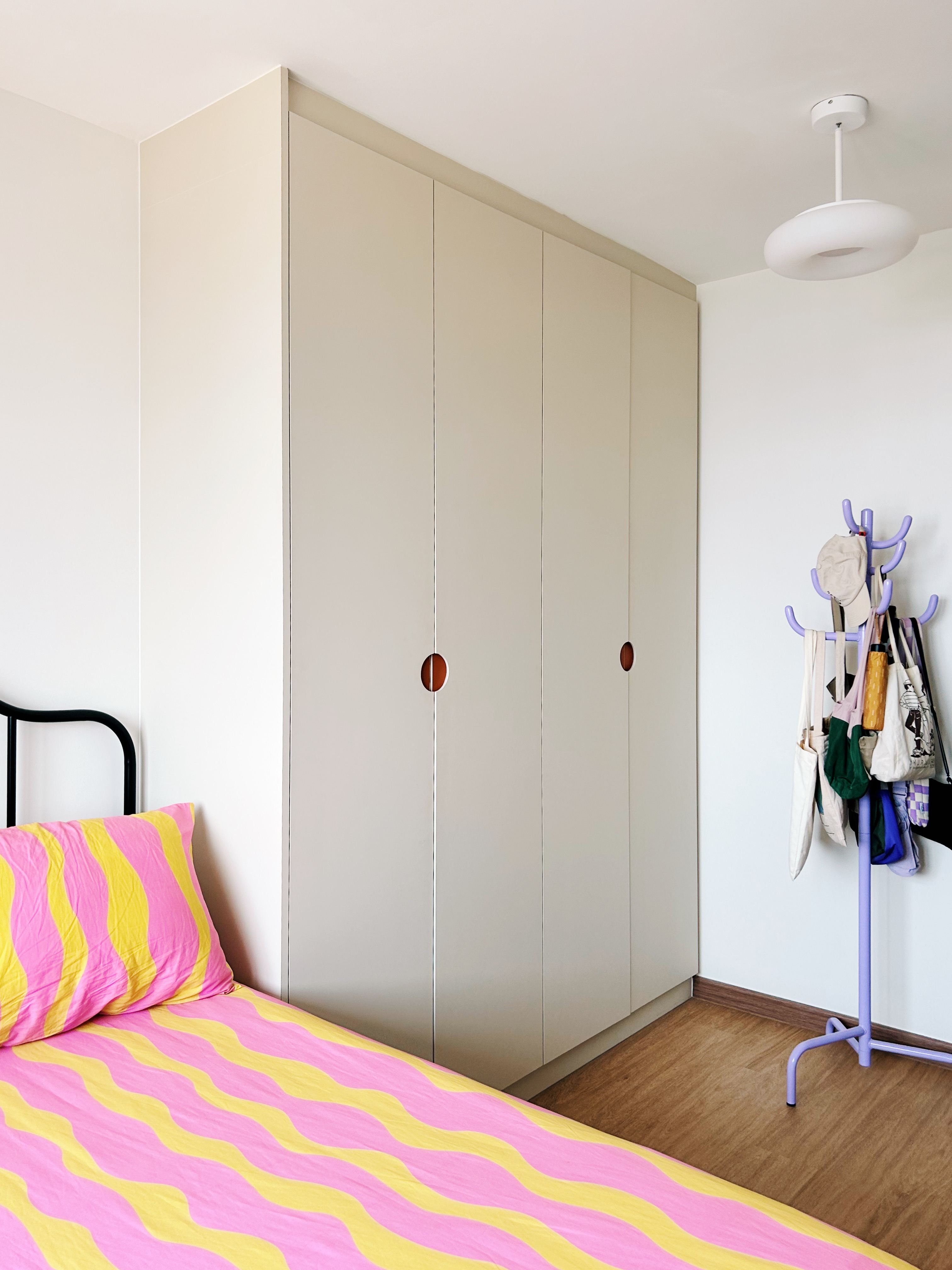 Step into our simple, sleep space - White wardrobe with circular handles, minimalist design, modern aesthetic, light beige