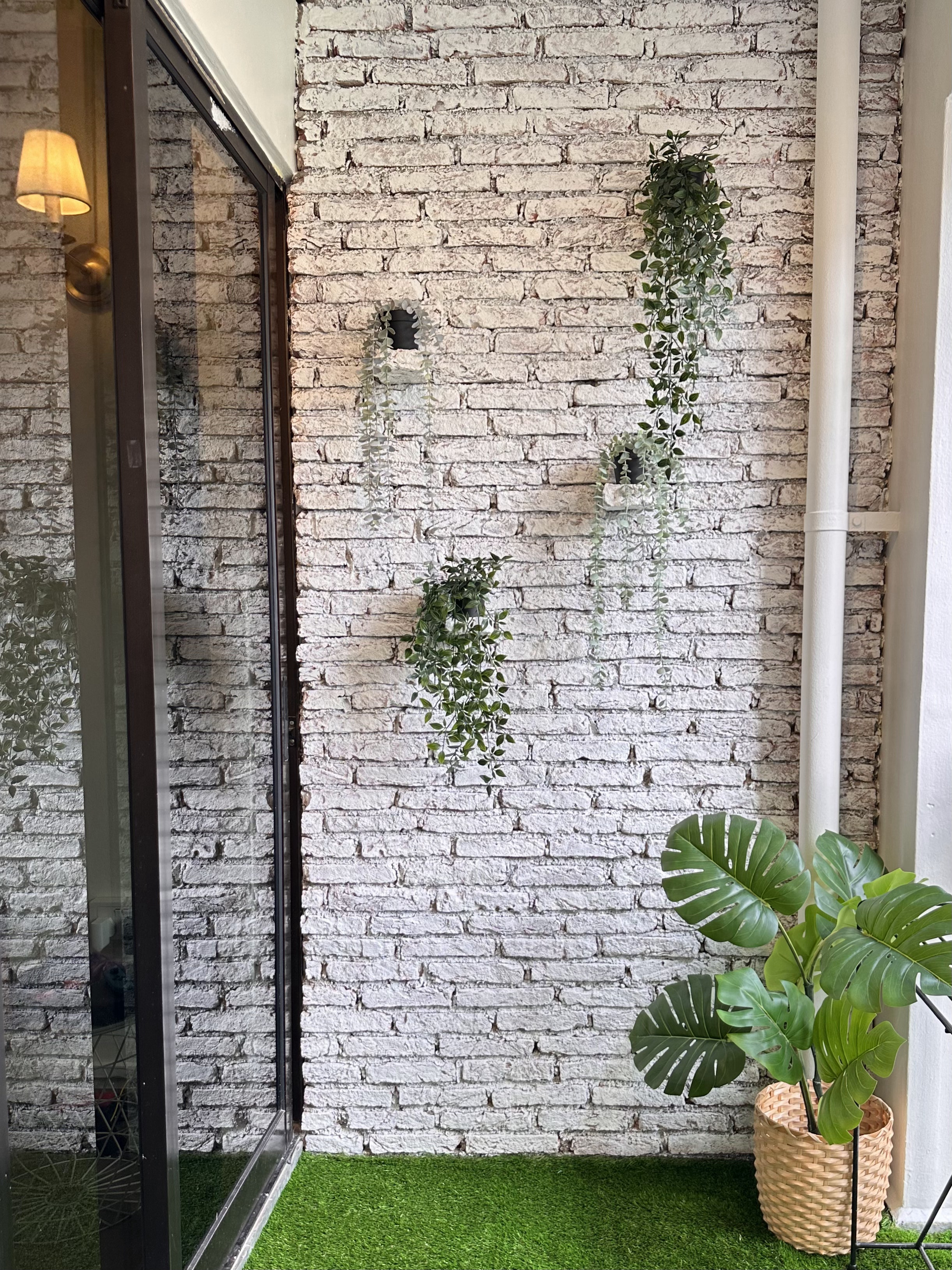 Verde Nook & Vertical Garden - White brick wall, green plants, hanging vines, indoor garden, modern decor, indoor plants