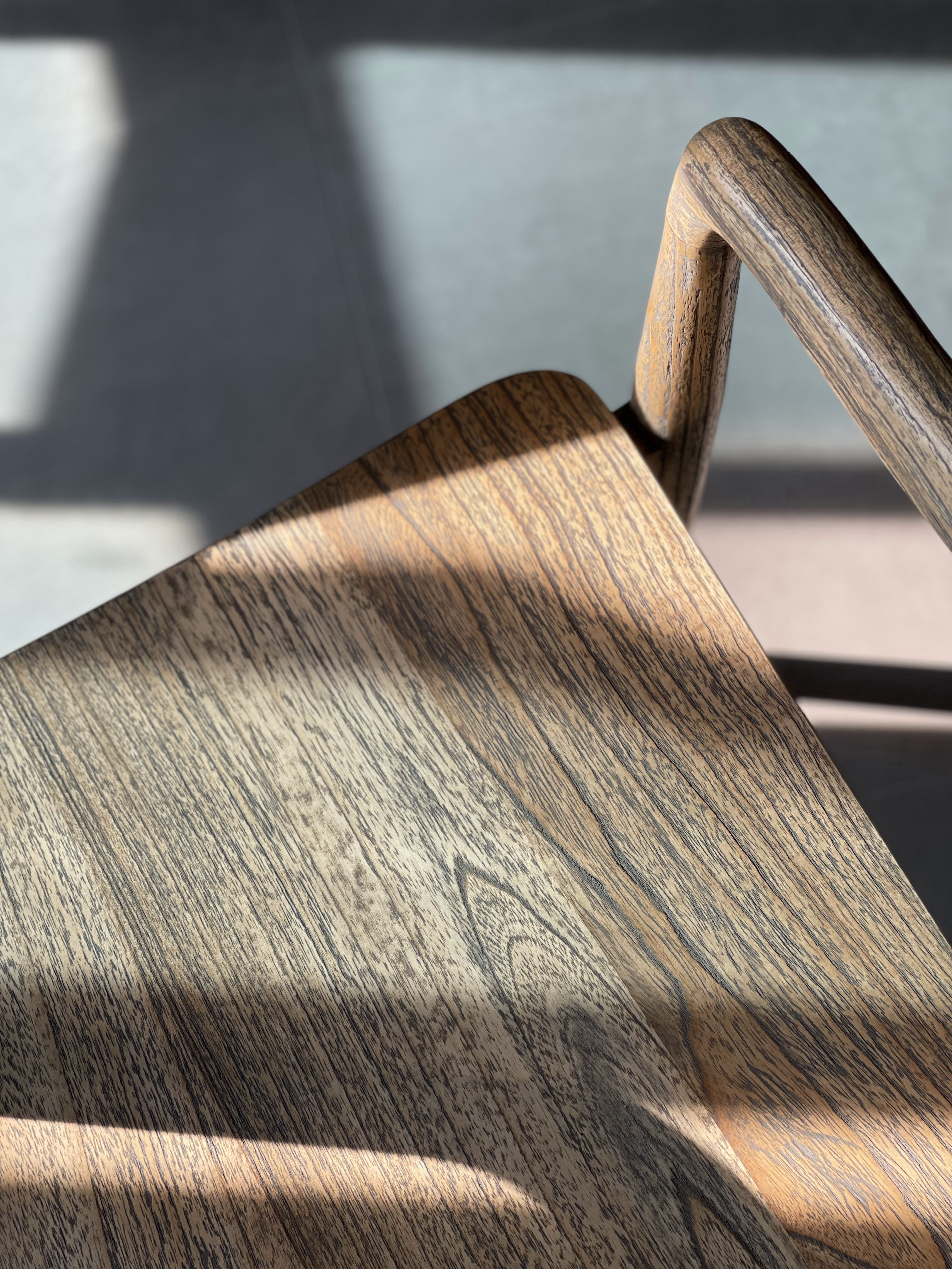The Dining Area: The Heart of Our Home  - Wooden chair, sunlight, shadow, natural light, rustic design, textured surface