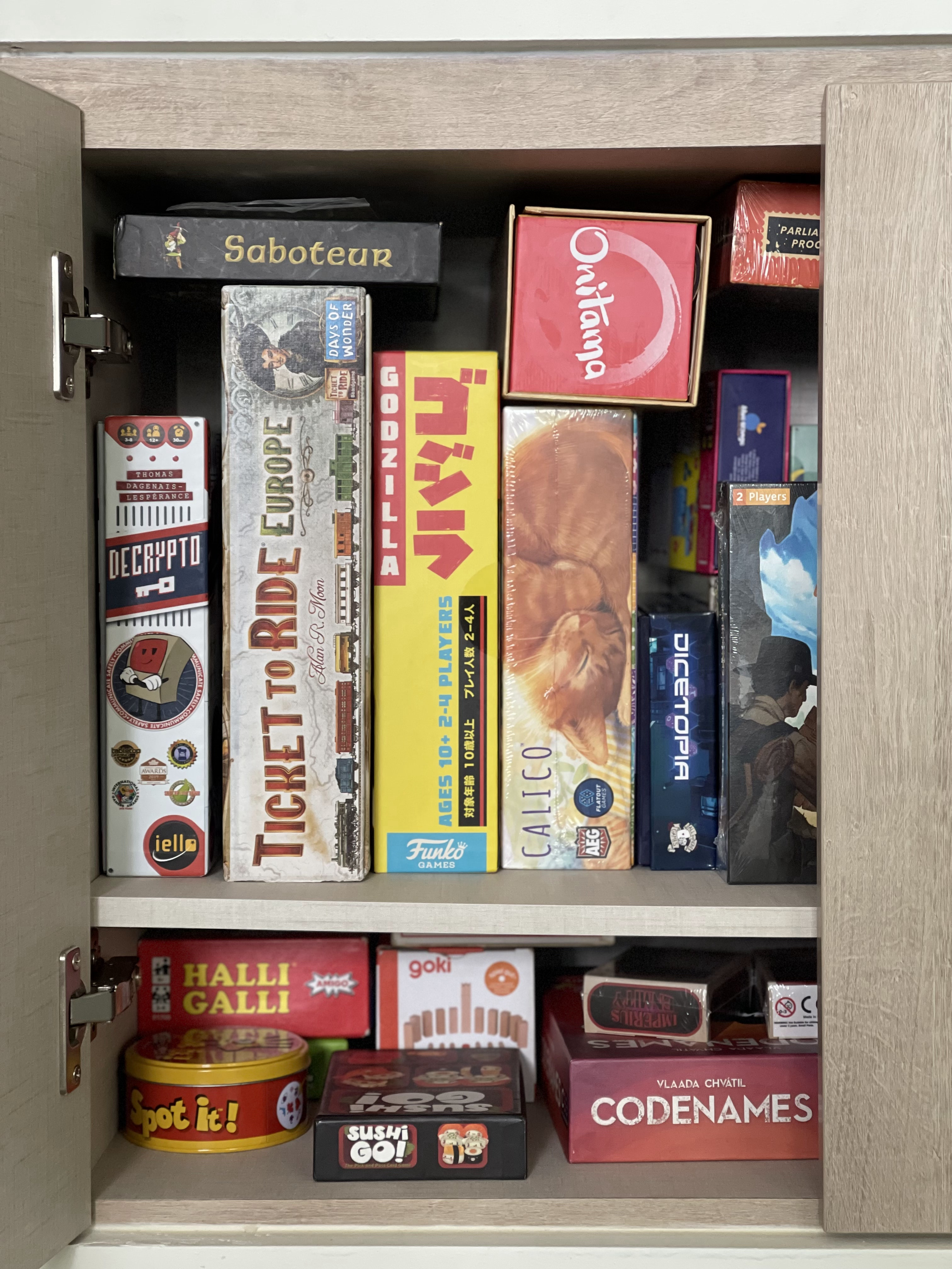 The Dining Area: The Heart of Our Home  - "Board games, board books, and puzzles in a well-organized cabinet", "Various board