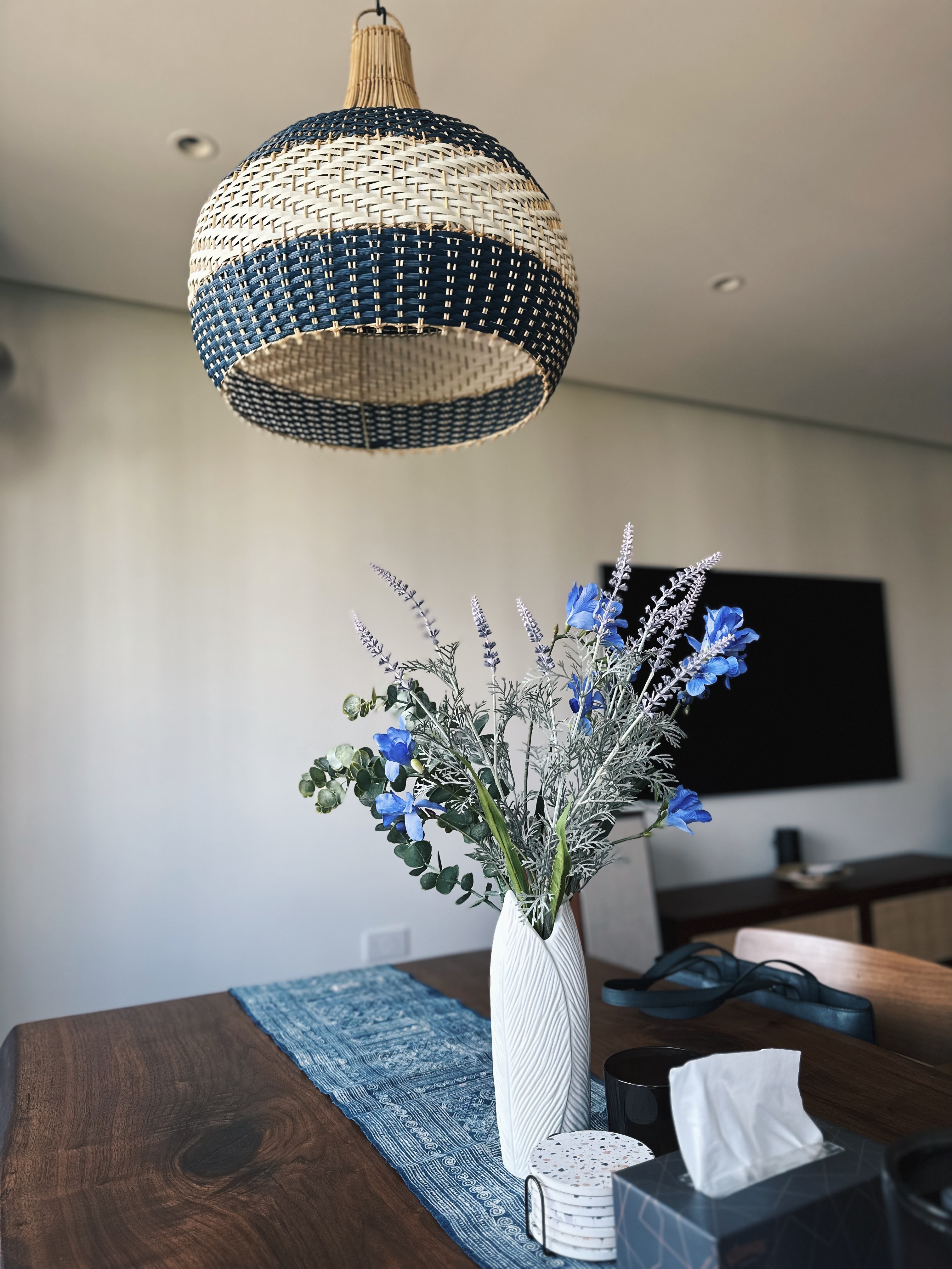 Dining space 🍷✨ - vase, blue flowers, white vase, blue and white flowers, hanging light fixture, modern decor, indoor