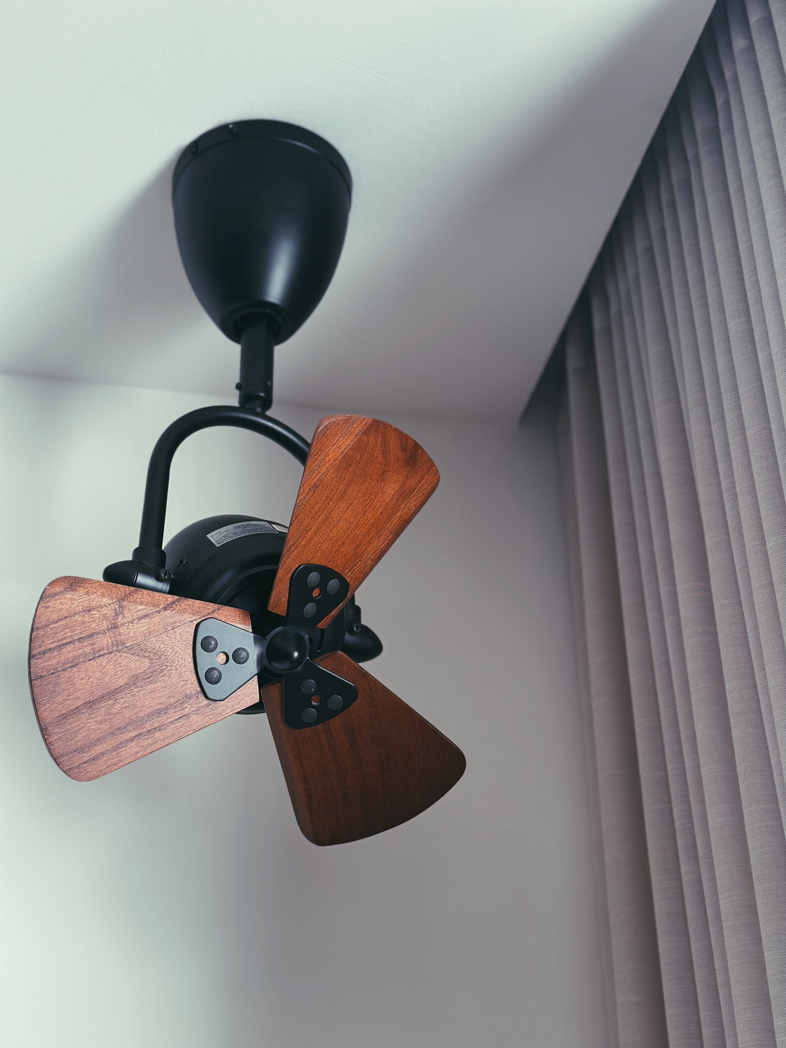 Dining space 🍷✨ - Wooden ceiling fan, modern design, dual blades, black metal frame, ceiling-mounted, light fixture, soft