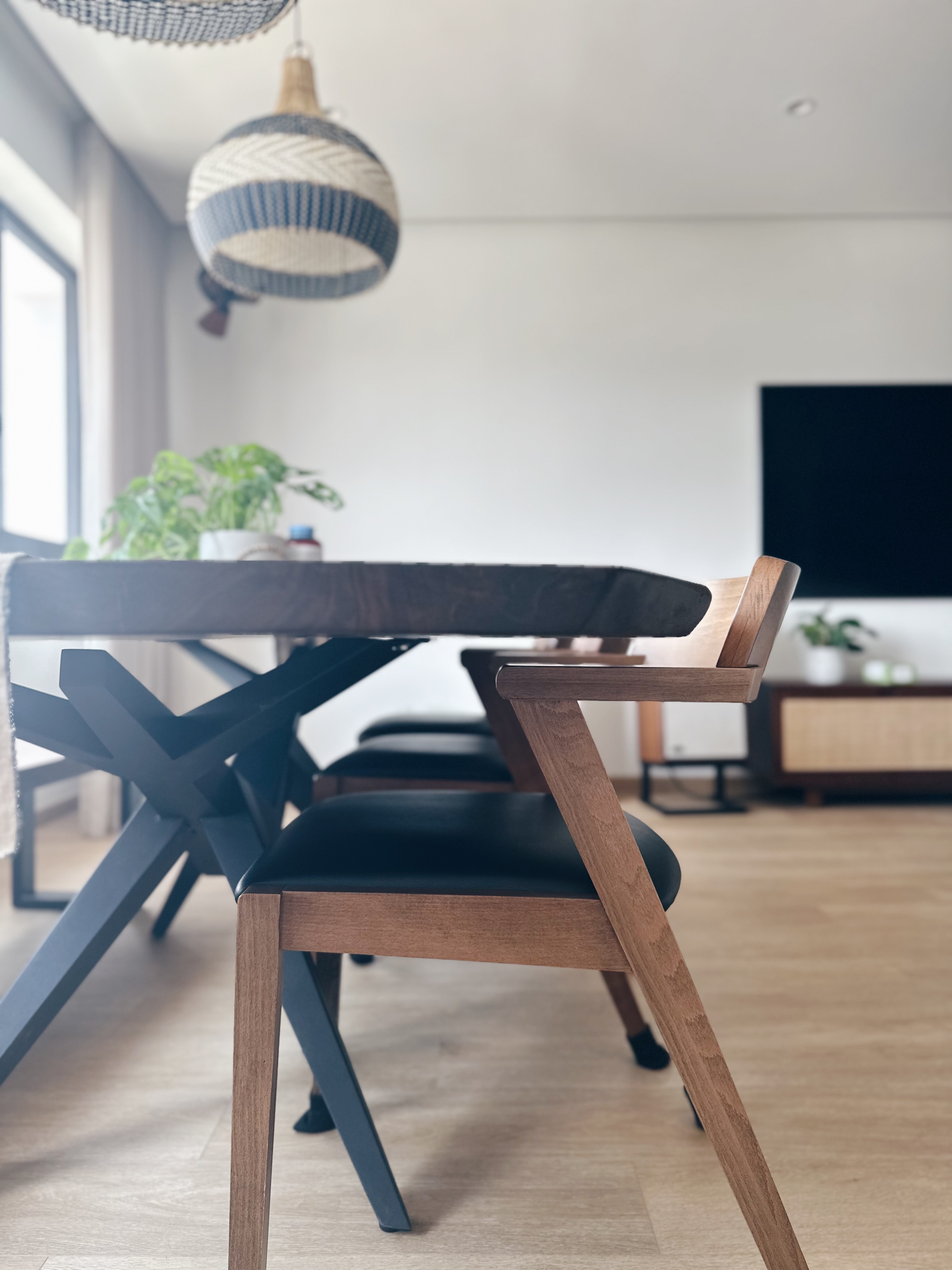 Dining space 🍷✨ - modern dining room, minimalist furniture, wooden dining chairs, black leather seats, contemporary design