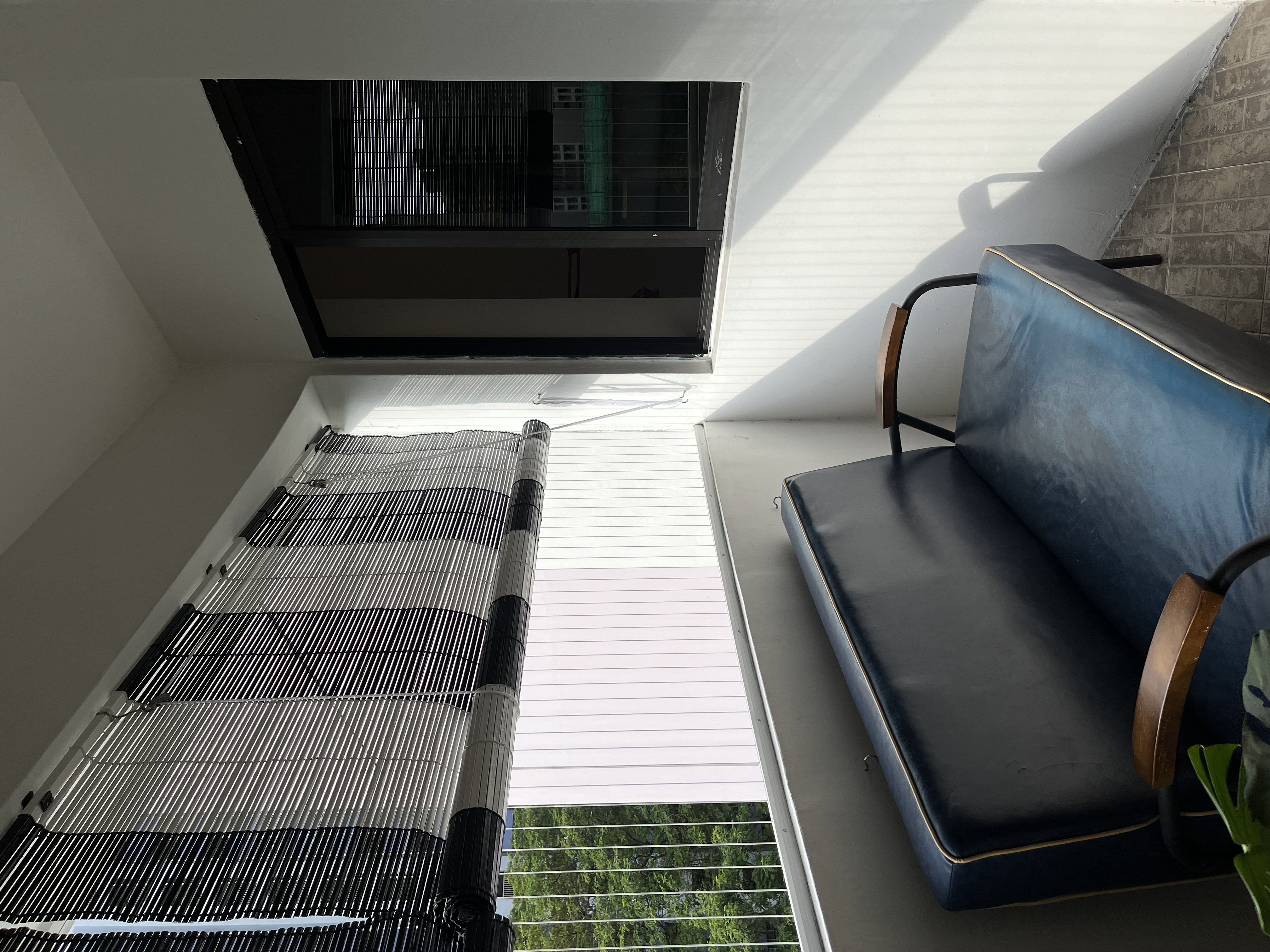 Indoor-Outdoor Living: Creating a Sanctuary at our Balcony - Modern living room, cozy seating area, minimalist design, large