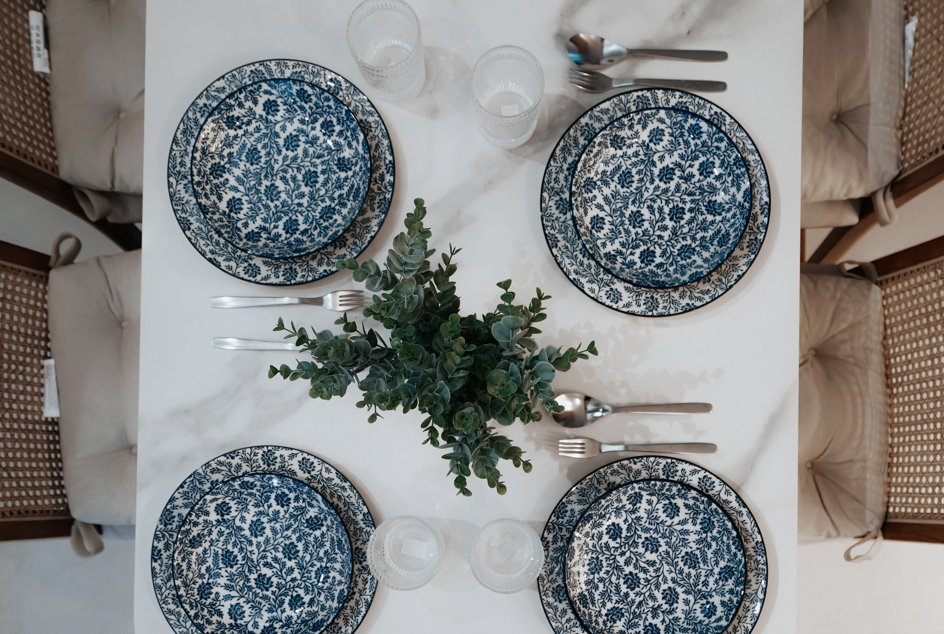 We do Dining but on the Move - Blue floral pattern plates, white marble table, elegant dining setup, modern dining table