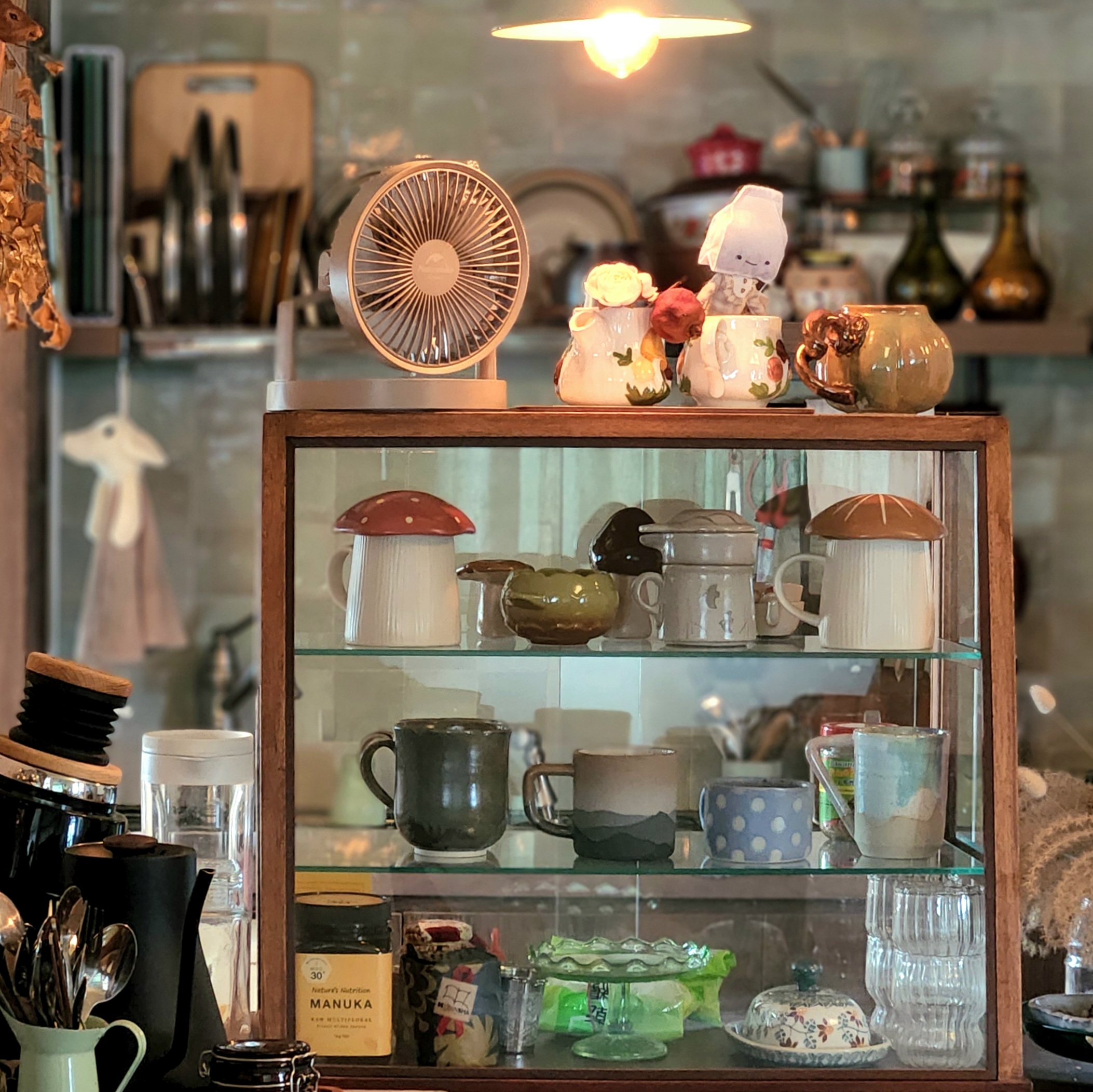 Tea time! An alt. multifunctional dining space in a zakka cottage home - glass cabinet, vintage decor, ceramic items, wooden