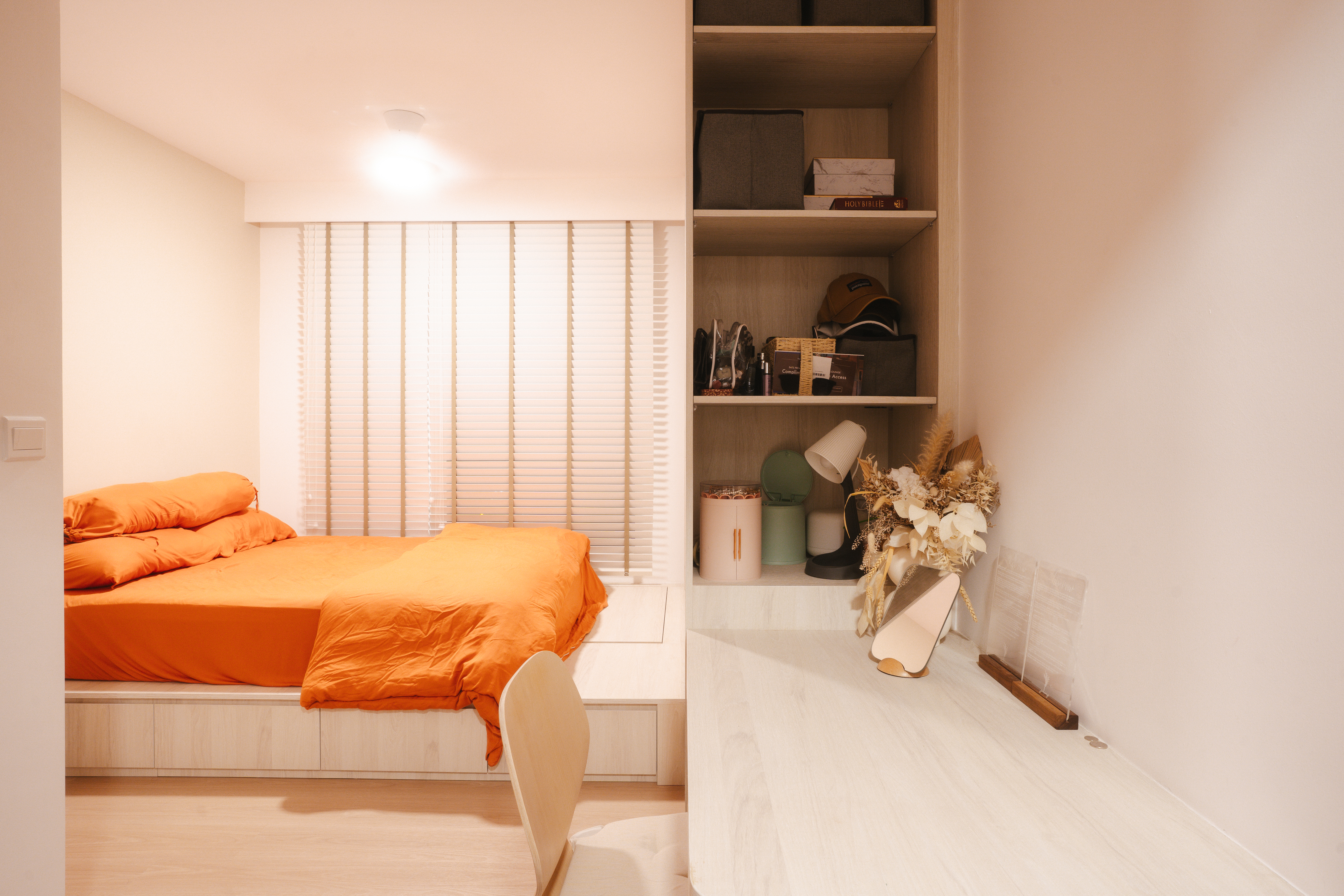 Our simple bedroom design with the focus on storage - Modern bedroom with orange bedding, minimalist decor, built-in shelving