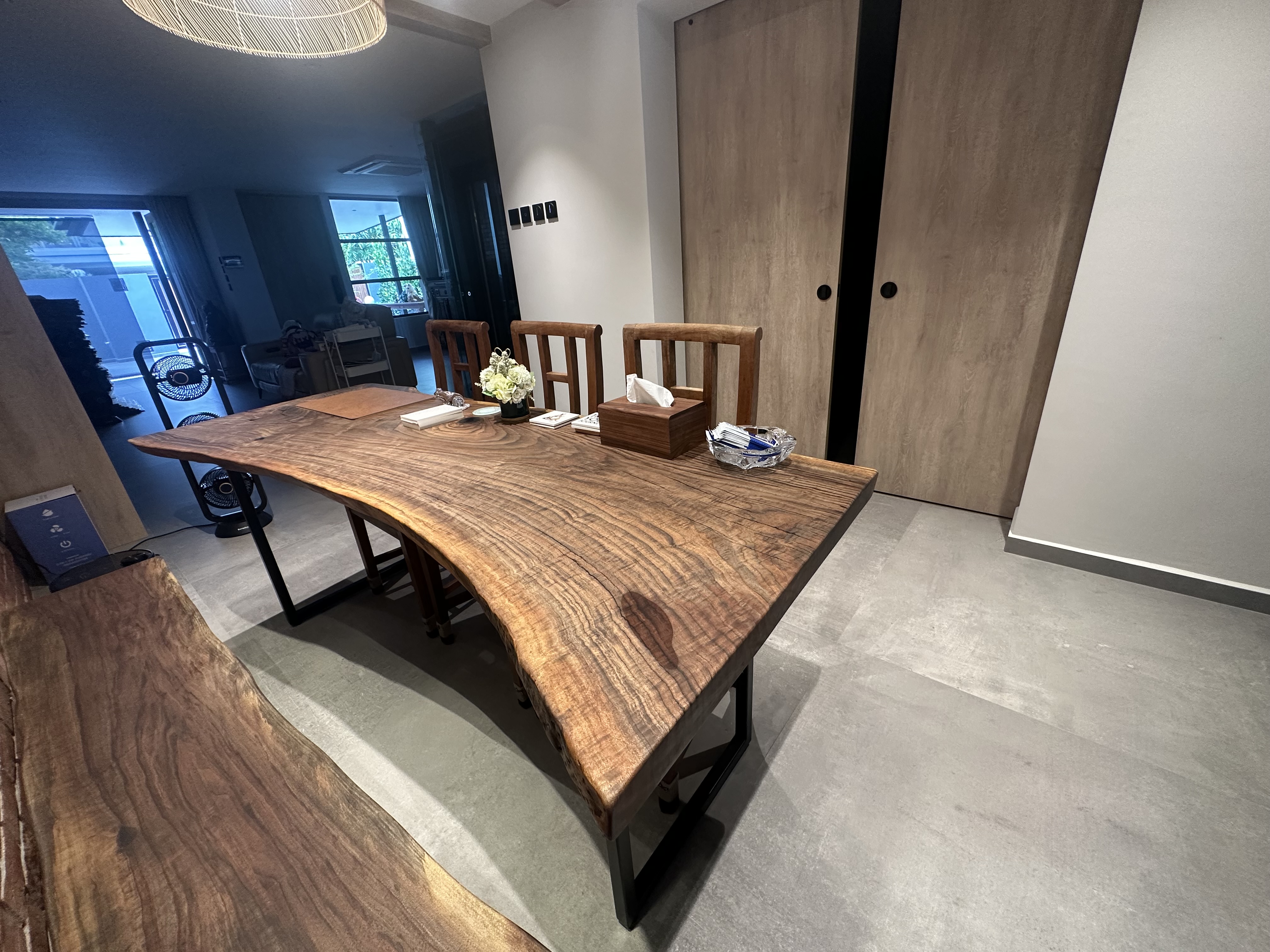 Makan Area at Resort.d.Lala! - Wooden dining table, minimalist design, modern decor, natural wood grain, elegant table