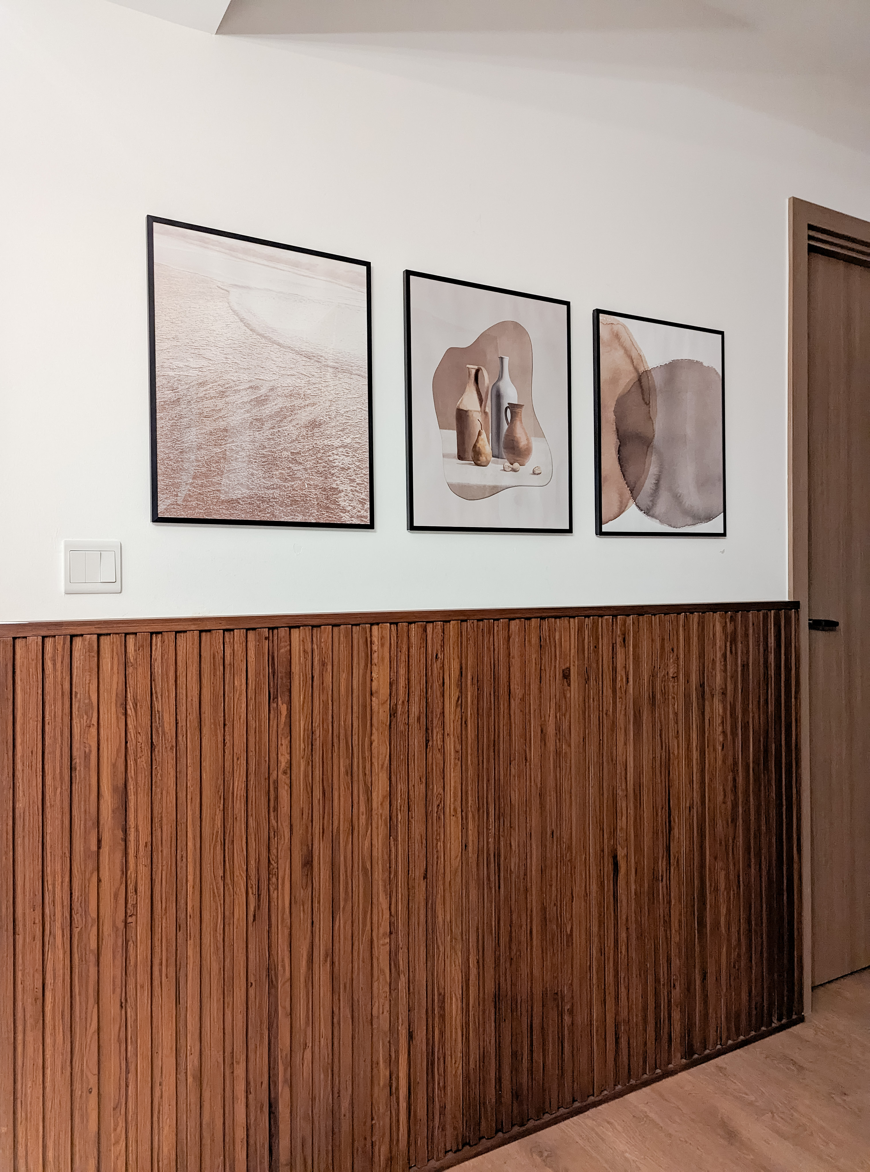 Transforming spaces and elevating spaces with Faux Plants - Wooden panel, wooden wall, vertical wooden slats, rustic wooden