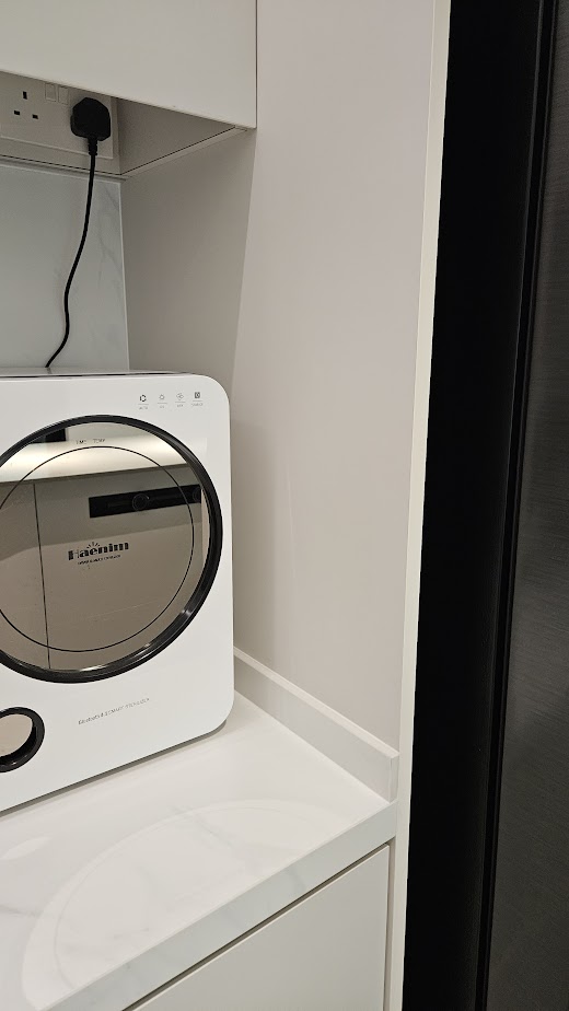 A Smart and Functional Kitchen - Smart home appliance, modern kitchen setting, white appliance, sleek design, built-in