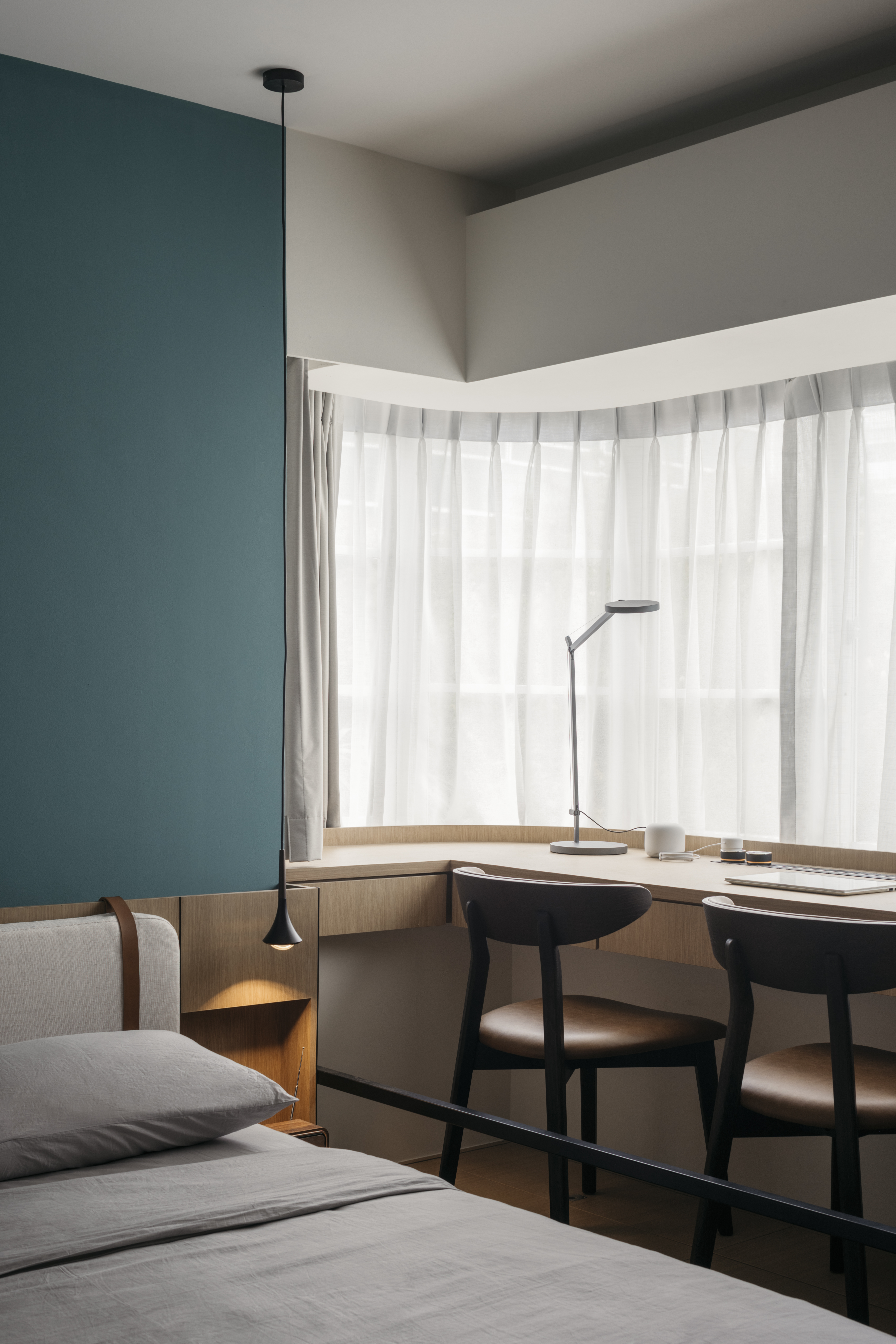 Redesigning an old condo unit to be inviting and warm - Modern minimalist bedroom, sleek desk, contemporary chair, soft