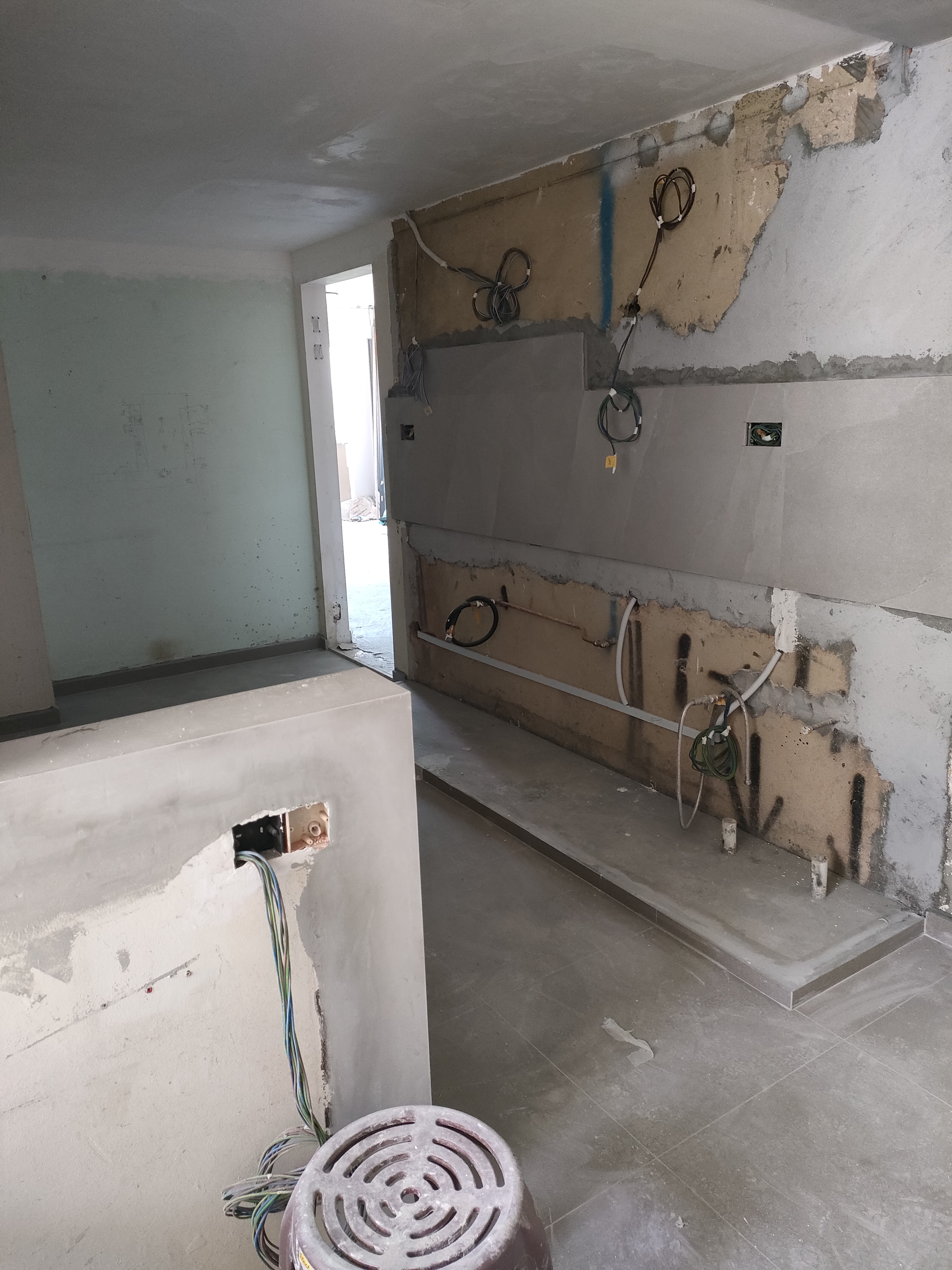 the heart of our home--Our kitchen! - unfinished walls, unfinished ceiling, exposed wiring, electrical panel, unfinished