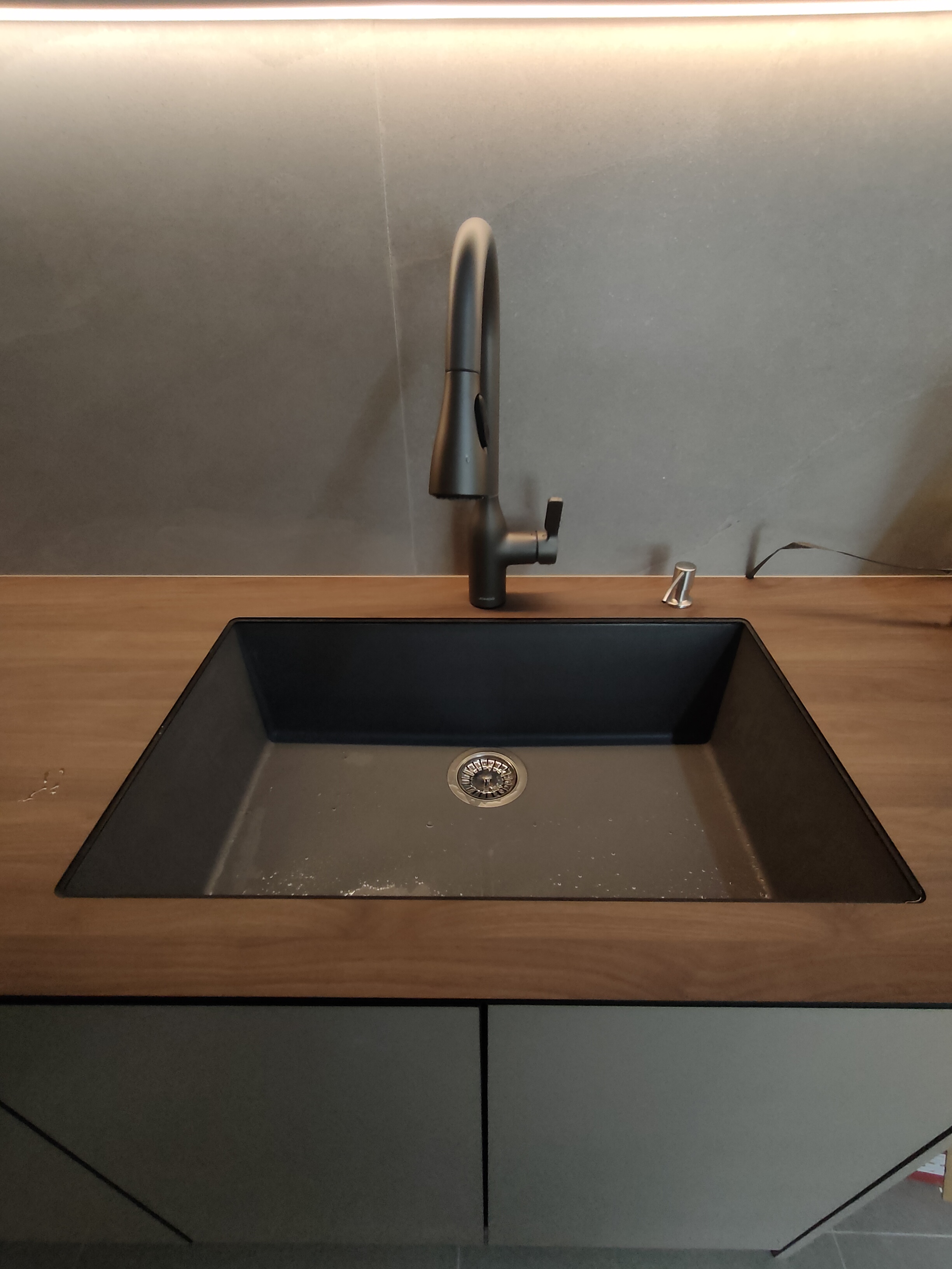 the heart of our home--Our kitchen! - Modern kitchen sink, sleek faucet, minimalist design, dark gray color, stainless steel