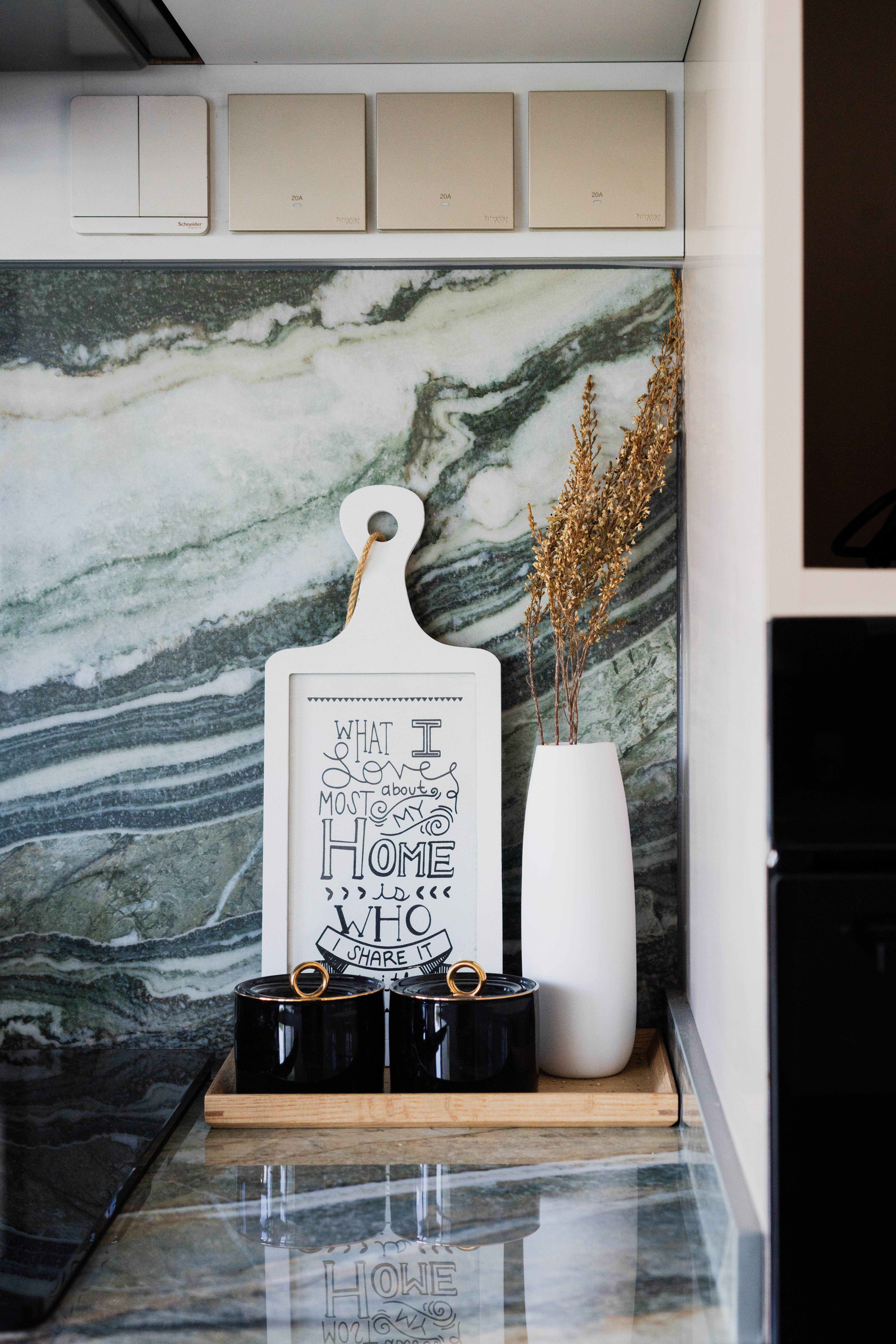 Kitchen Edition//  Terrazzo & Nature-Inspired Royal Peacock Marble - Marble backsplash, modern kitchen, black pots, white