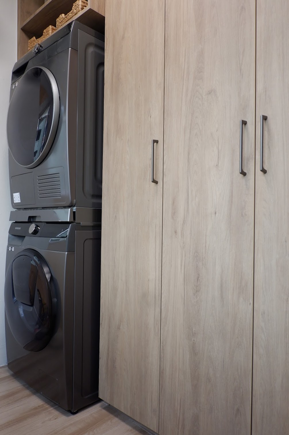 Take a Look at Our Dry and Wet Kitchens - Modern laundry unit with built-in dryer, sleek design, integrated control panel