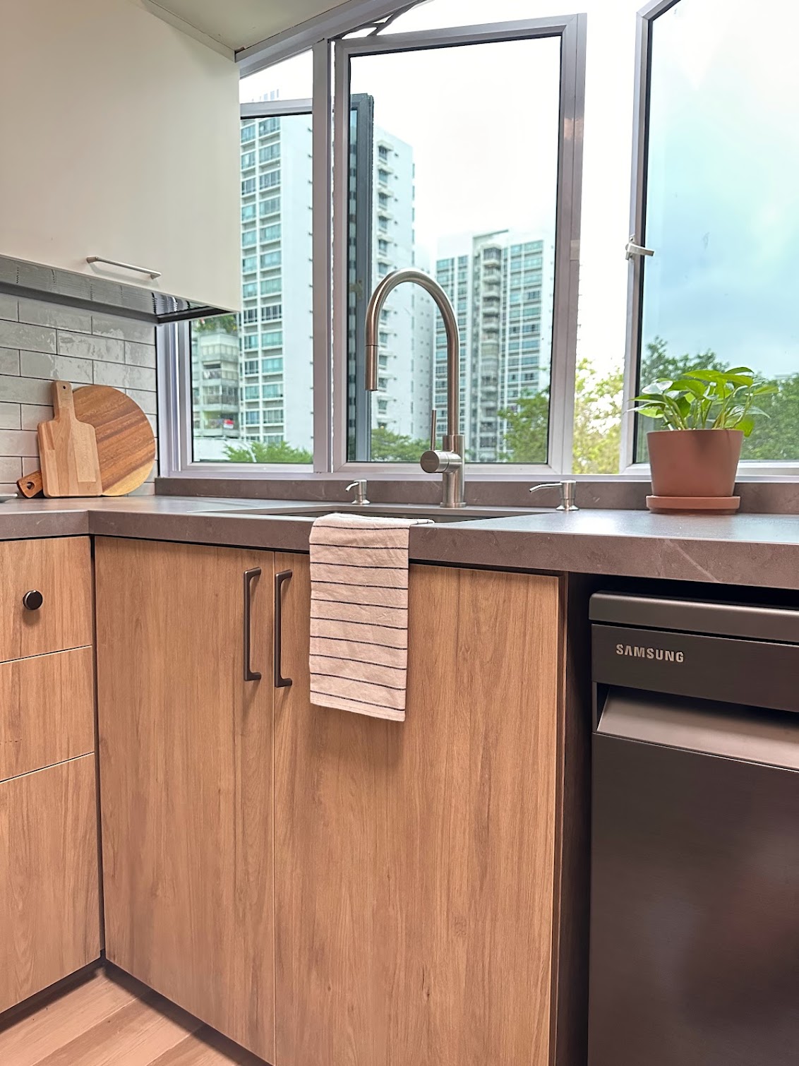 Take a Look at Our Dry and Wet Kitchens - Wooden kitchen cabinetry, modern sink, stainless steel faucet, tiled backsplash
