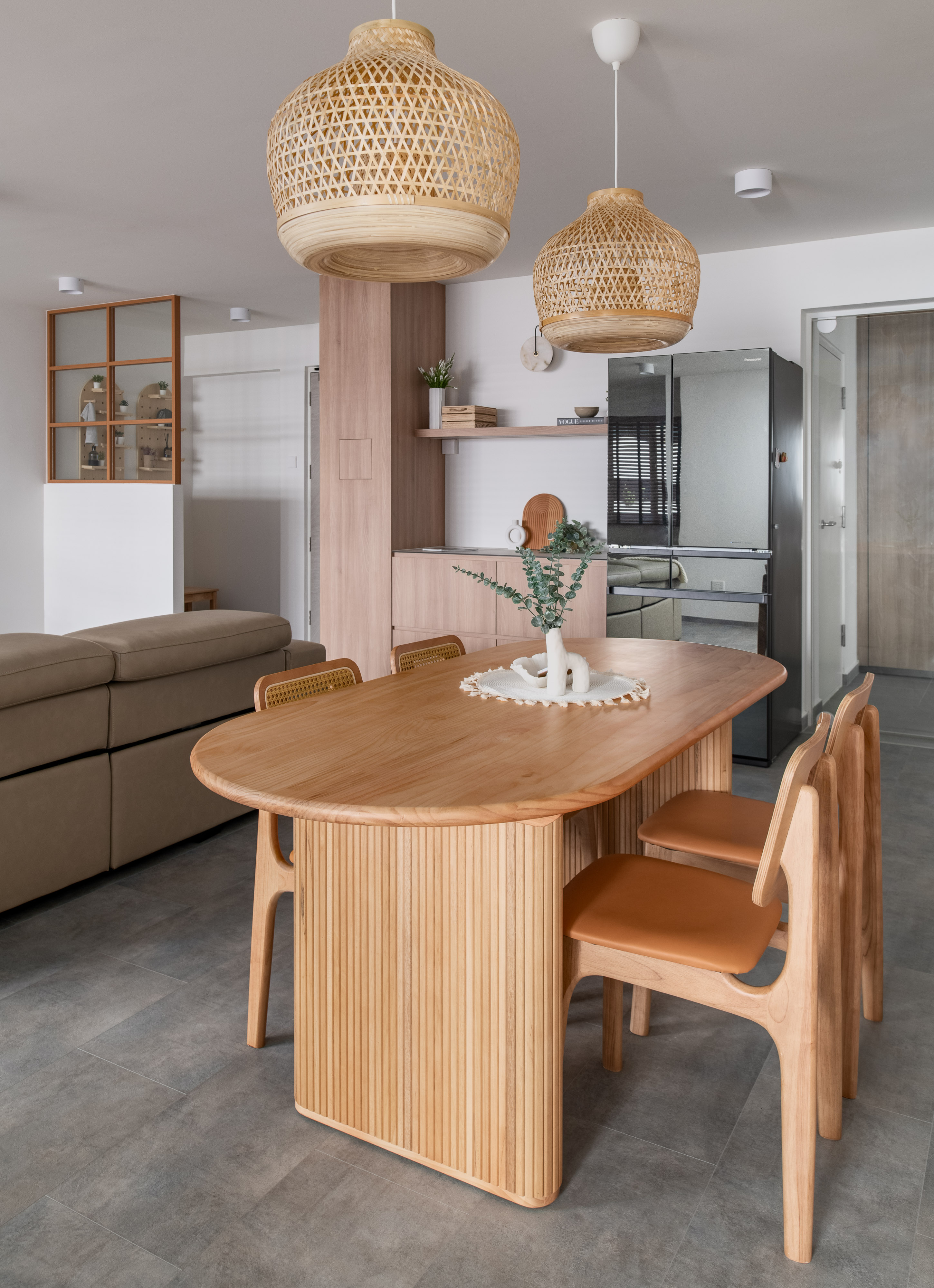 Embracing Japandi Design for a Tranquil Oasis - Modern dining room with wooden furniture, minimalist design, large round