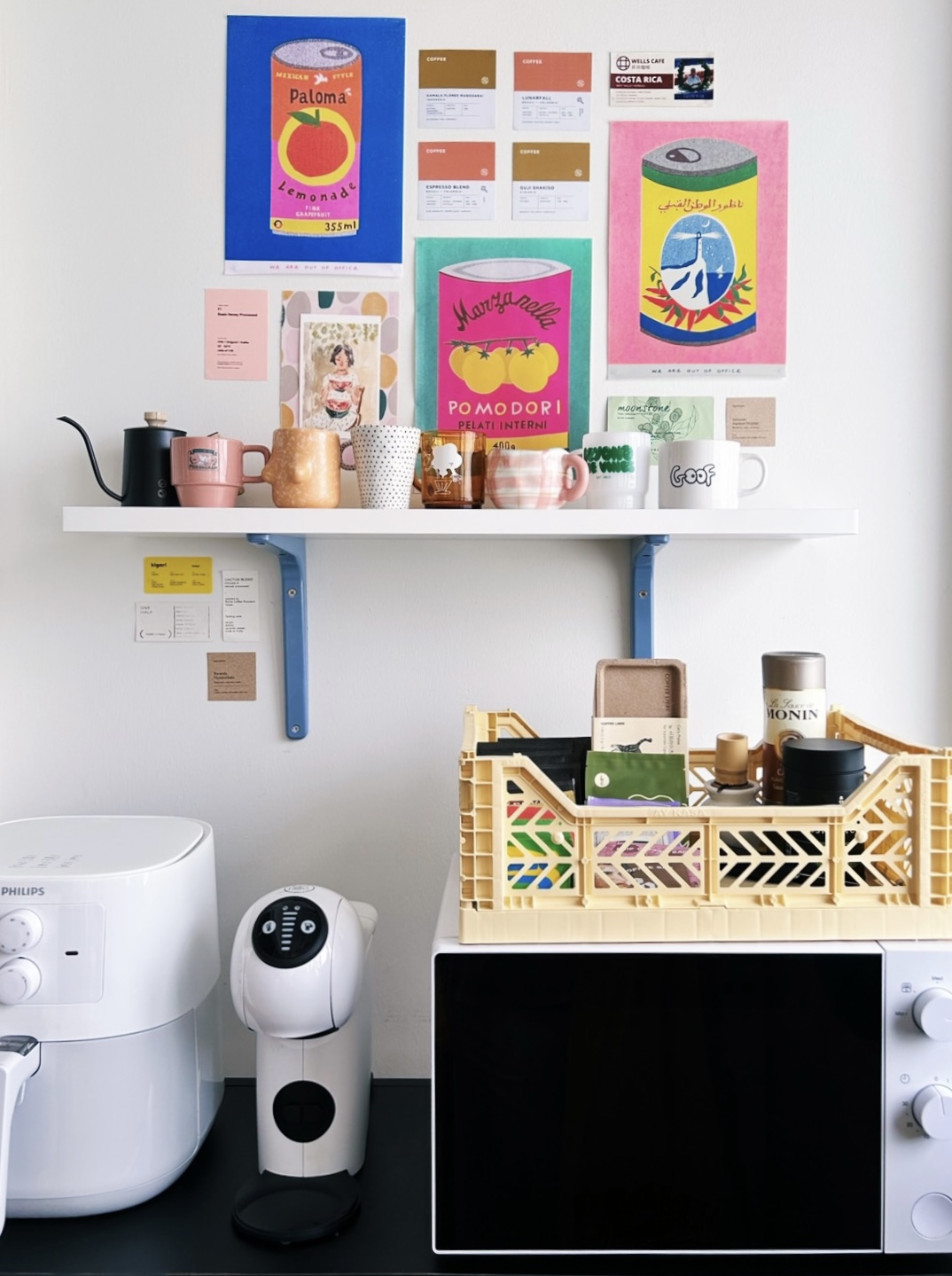 DIY Shelves for our coffee corner  - Wall-mounted shelf, colorful posters, coffee-themed designs, vintage-style cans