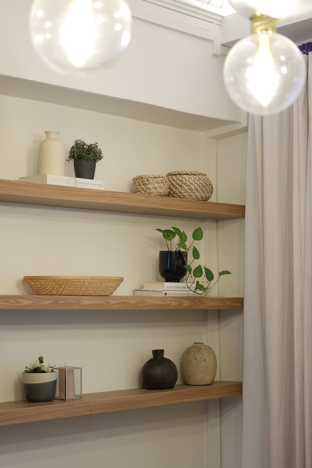 Verde Nook & Vertical Garden - Wooden shelves, minimalist decor, modern interior, soft lighting, white walls, natural
