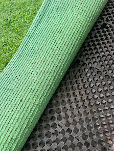 Verde Nook & Vertical Garden - Green textured surface, metal perforated background, parallel lines texture, ribbed design