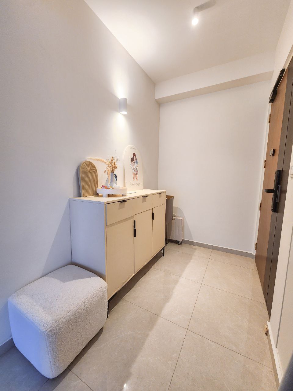 Simple 5-room with Minimal Carpentry - Light-colored, minimalist bathroom with sleek vanity, beige cabinets, built-in sink