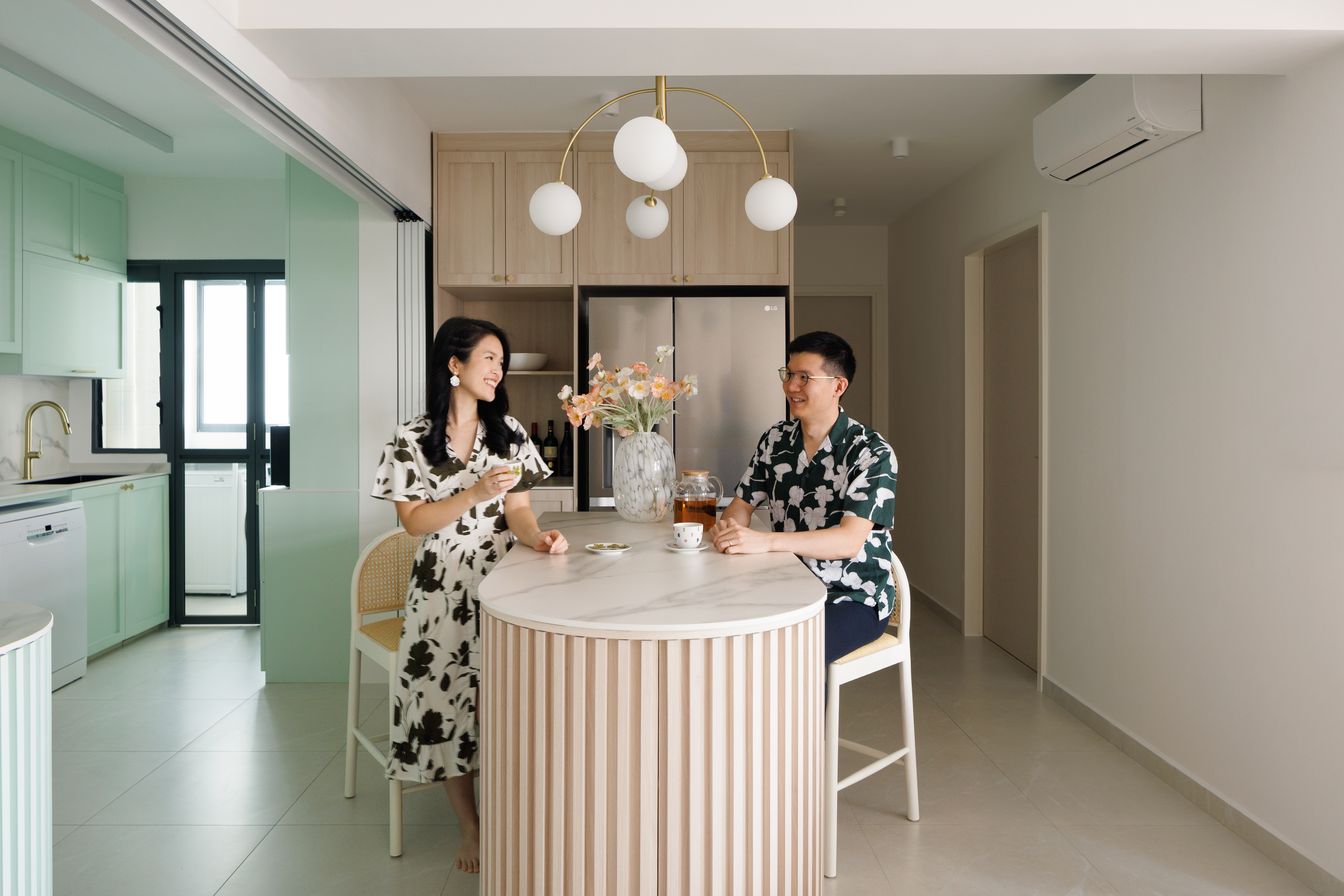 Modern Farmhouse Vibes: A Warm & Cosy 5 Room BTO   - Modern kitchen with light green cabinets, stainless steel refrigerator