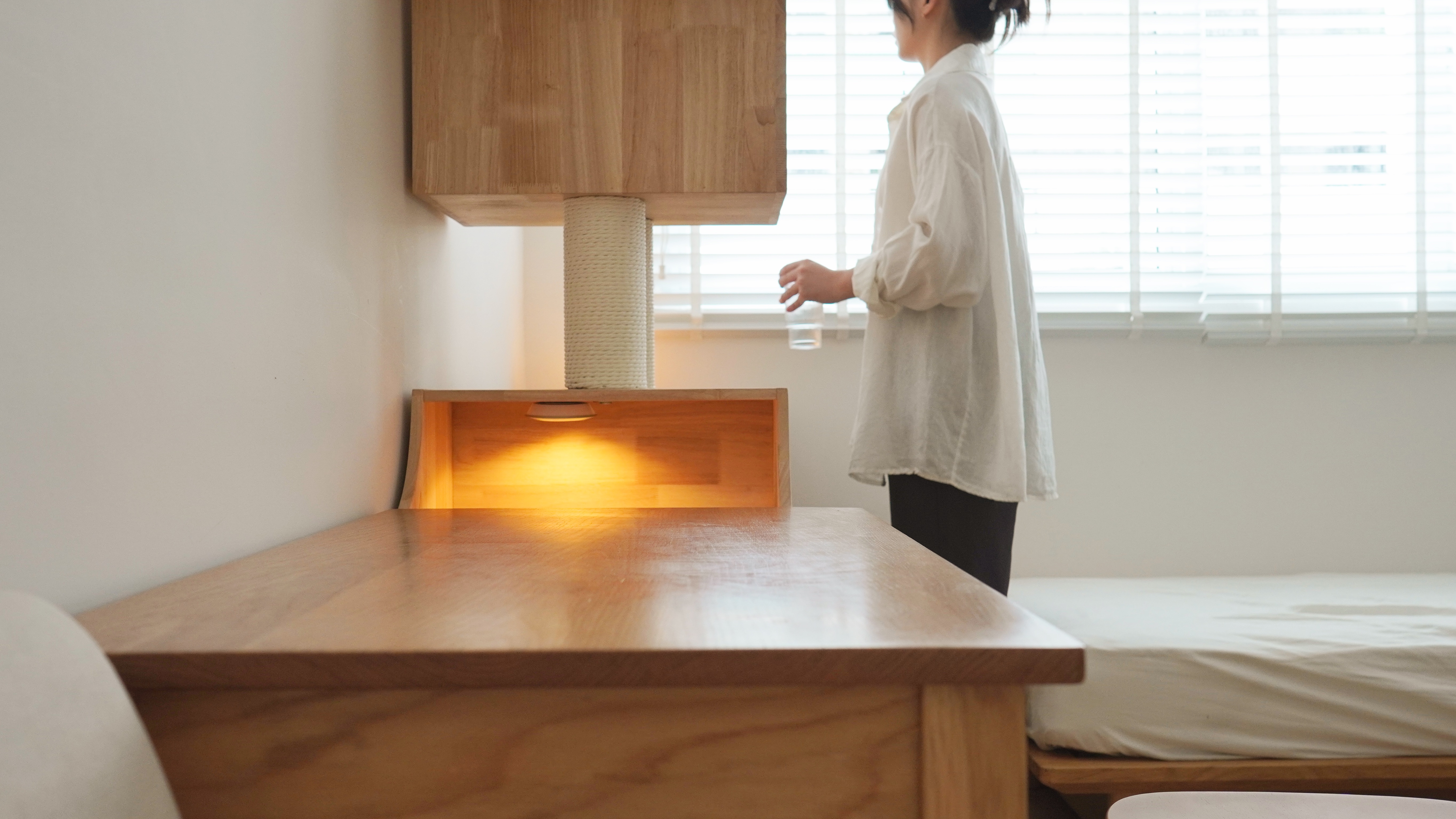 Home Transitioning into Japan Modern Theme - Wooden desk, minimalist room, natural light, wooden cabinet, cozy ambiance