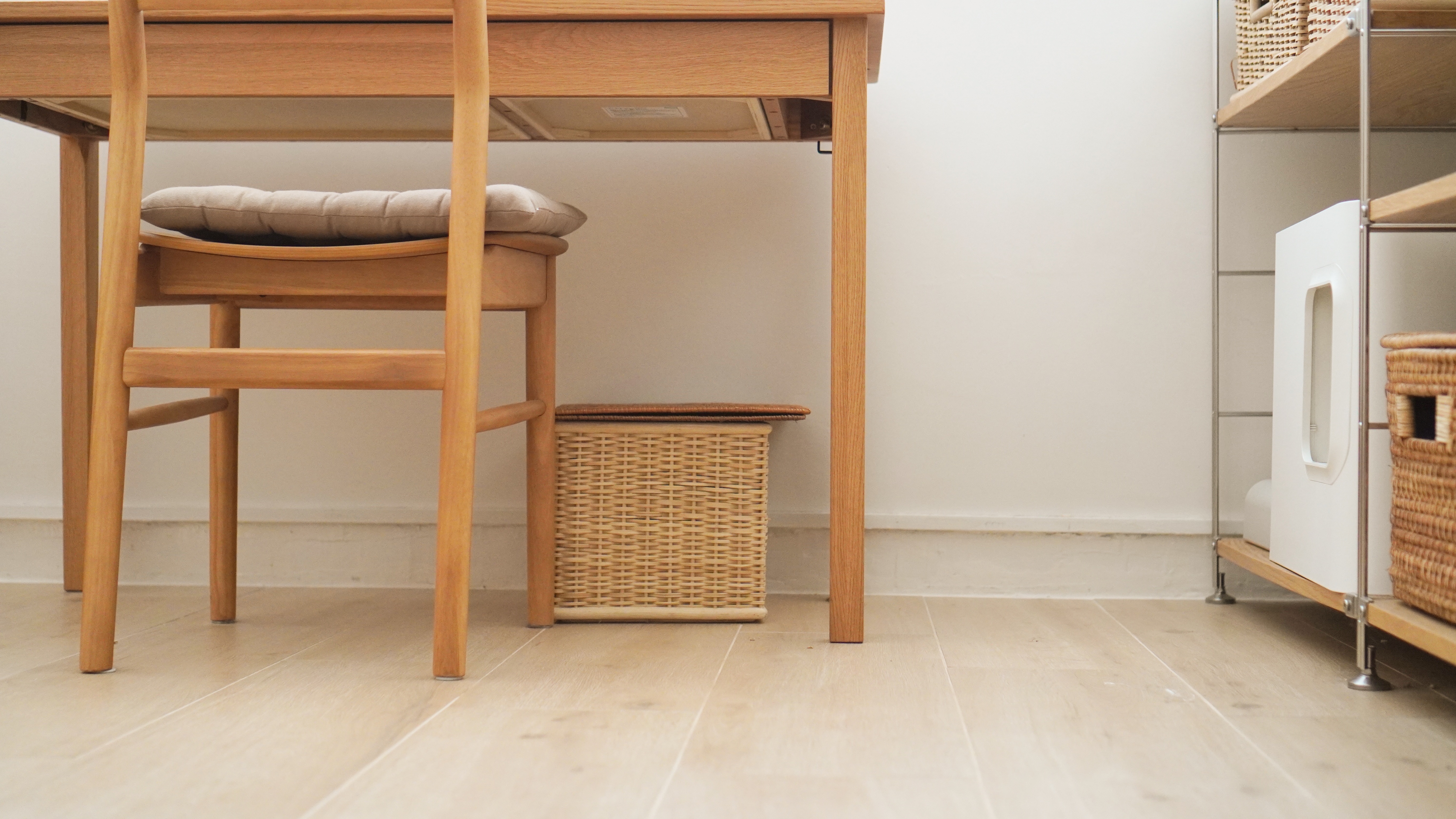 Home Transitioning into Japan Modern Theme - Wooden dining table with cushioned chair, light wooden floor, minimalist kitchen