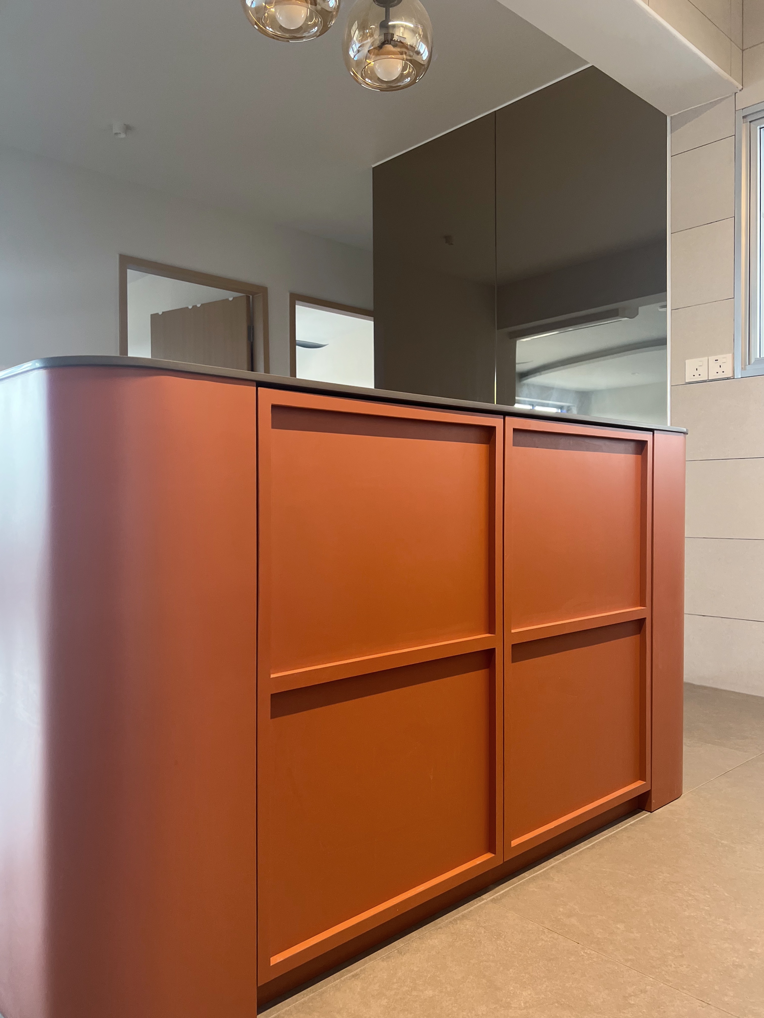 Our Topless Kitchen - Modern kitchen island, sleek design, orange color, minimalist style, built-in cabinetry, floating