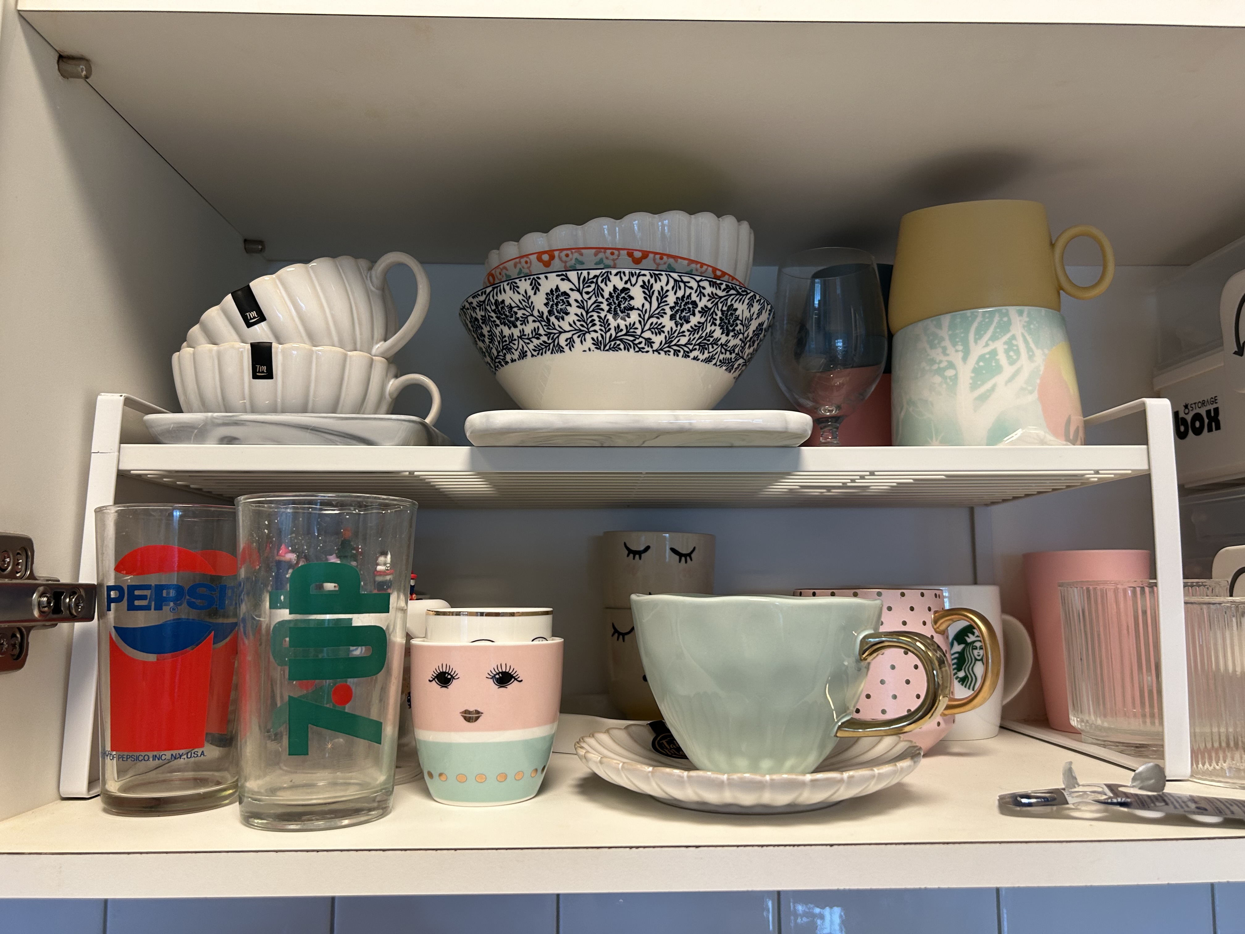 Our small farmhouse kitchen - possibilities of a small kitchen space - Clear glass, vintage mugs, colorful ceramic, white
