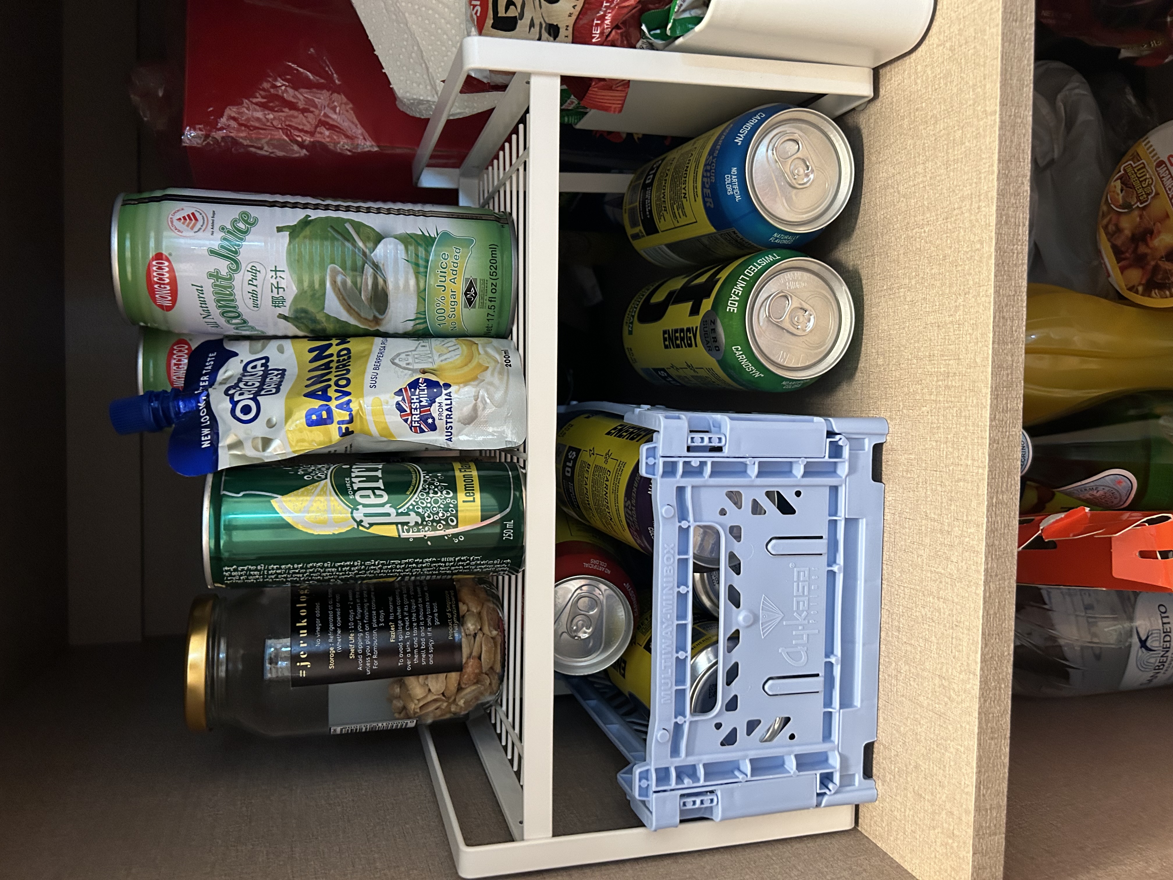 Our small farmhouse kitchen - possibilities of a small kitchen space - Stacked beverage cans in a pantry drawer, Variety of