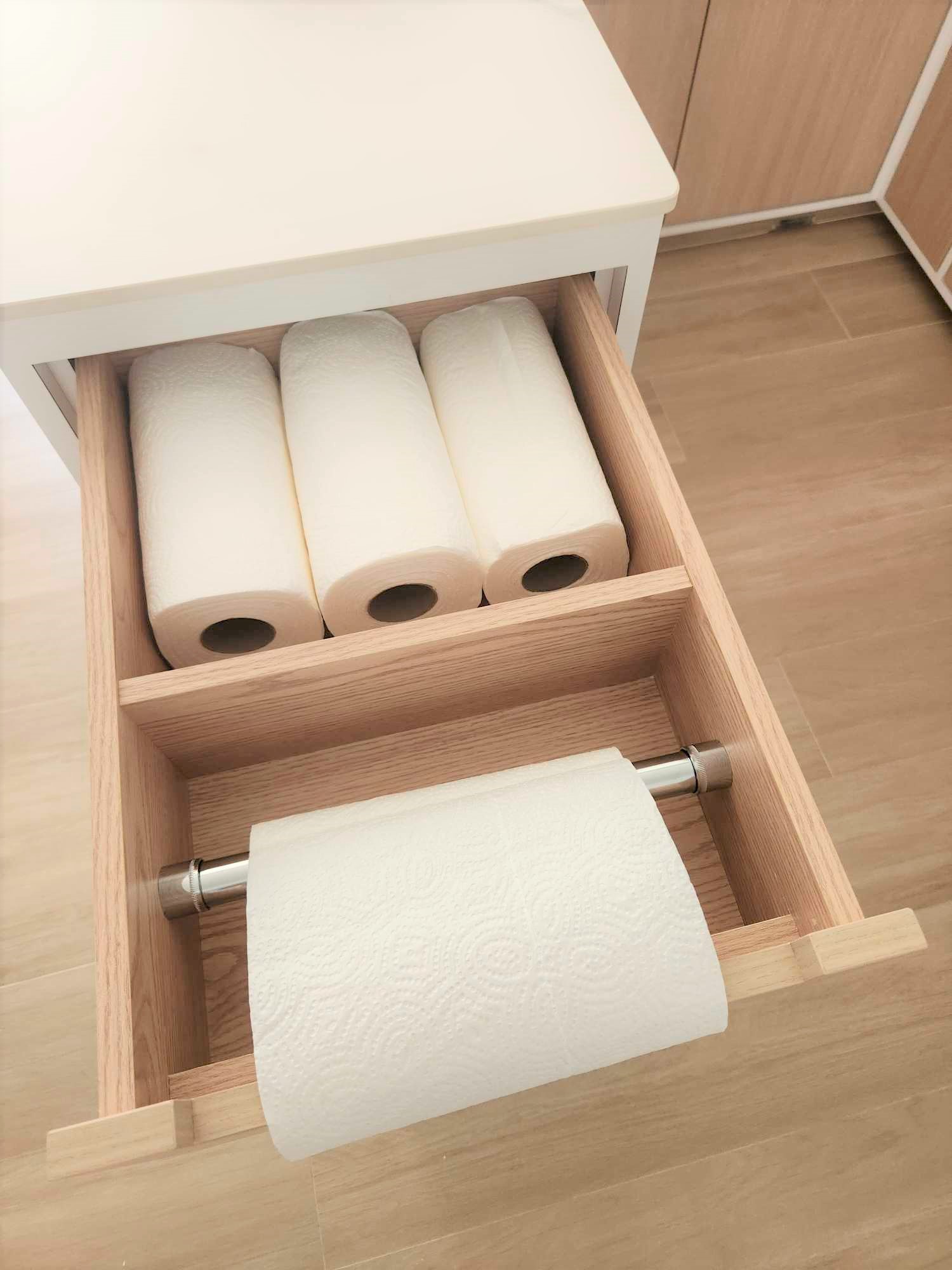 Spacious U-shaped kitchen  - Wooden drawer, white toilet paper rolls, neatly organized, light wooden drawer, light brown
