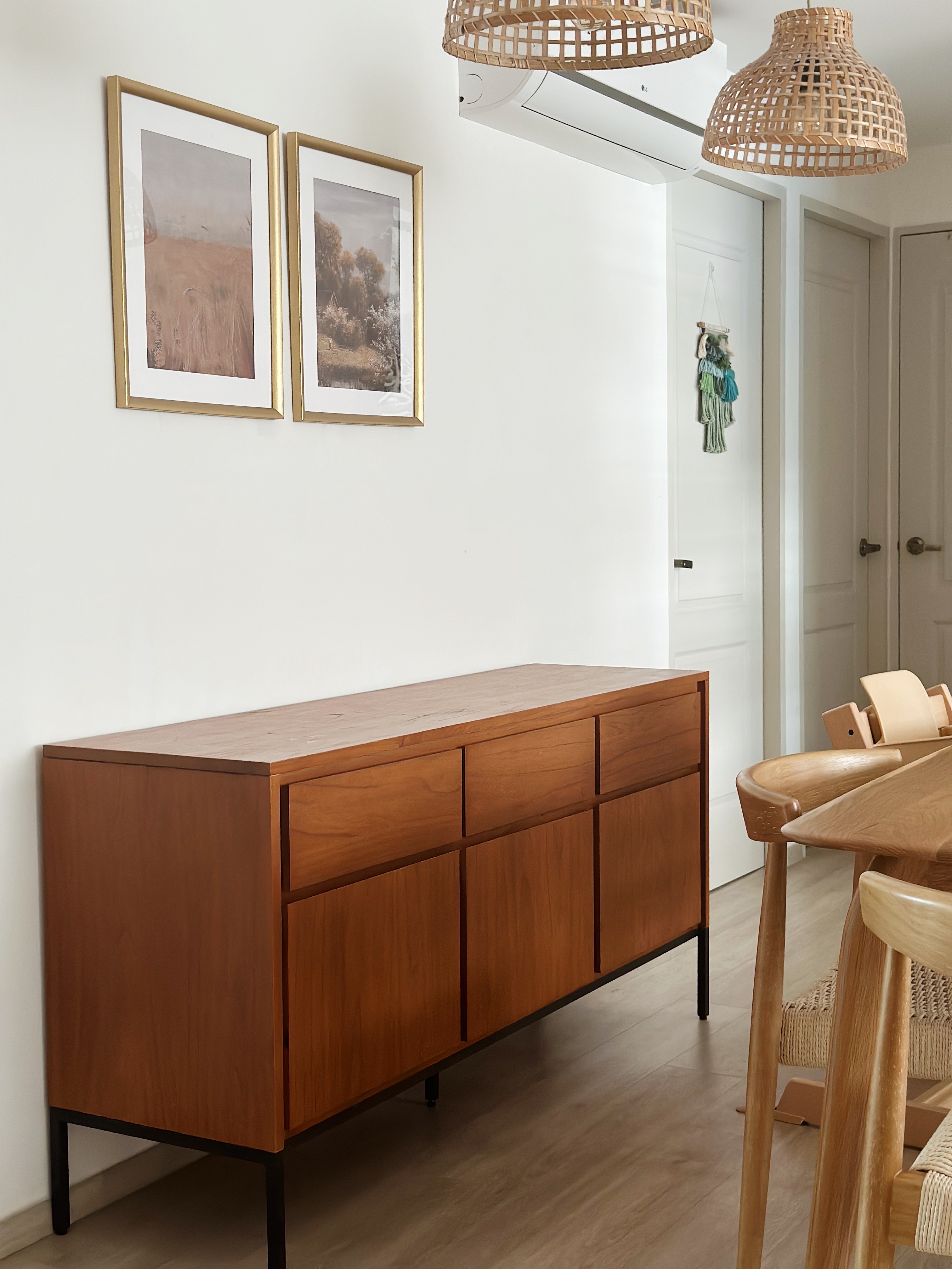 Warm & Cosy Minimal Dining Space - Wooden cabinet with black legs, minimalist design, light brown finish, built-in storage