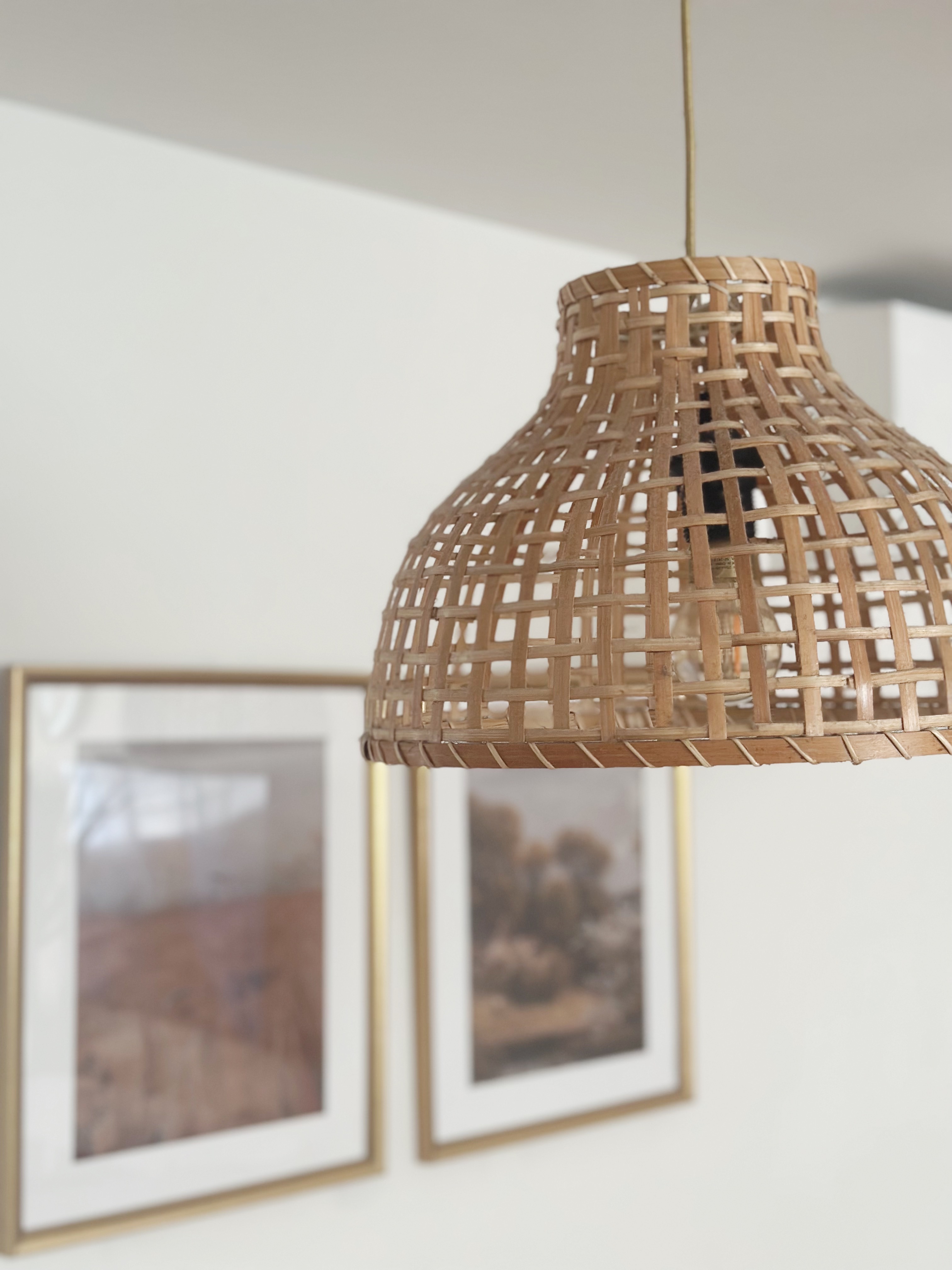 Warm & Cosy Minimal Dining Space - Wicker pendant light, natural wood texture, elegant design, hanging fixture, minimalist