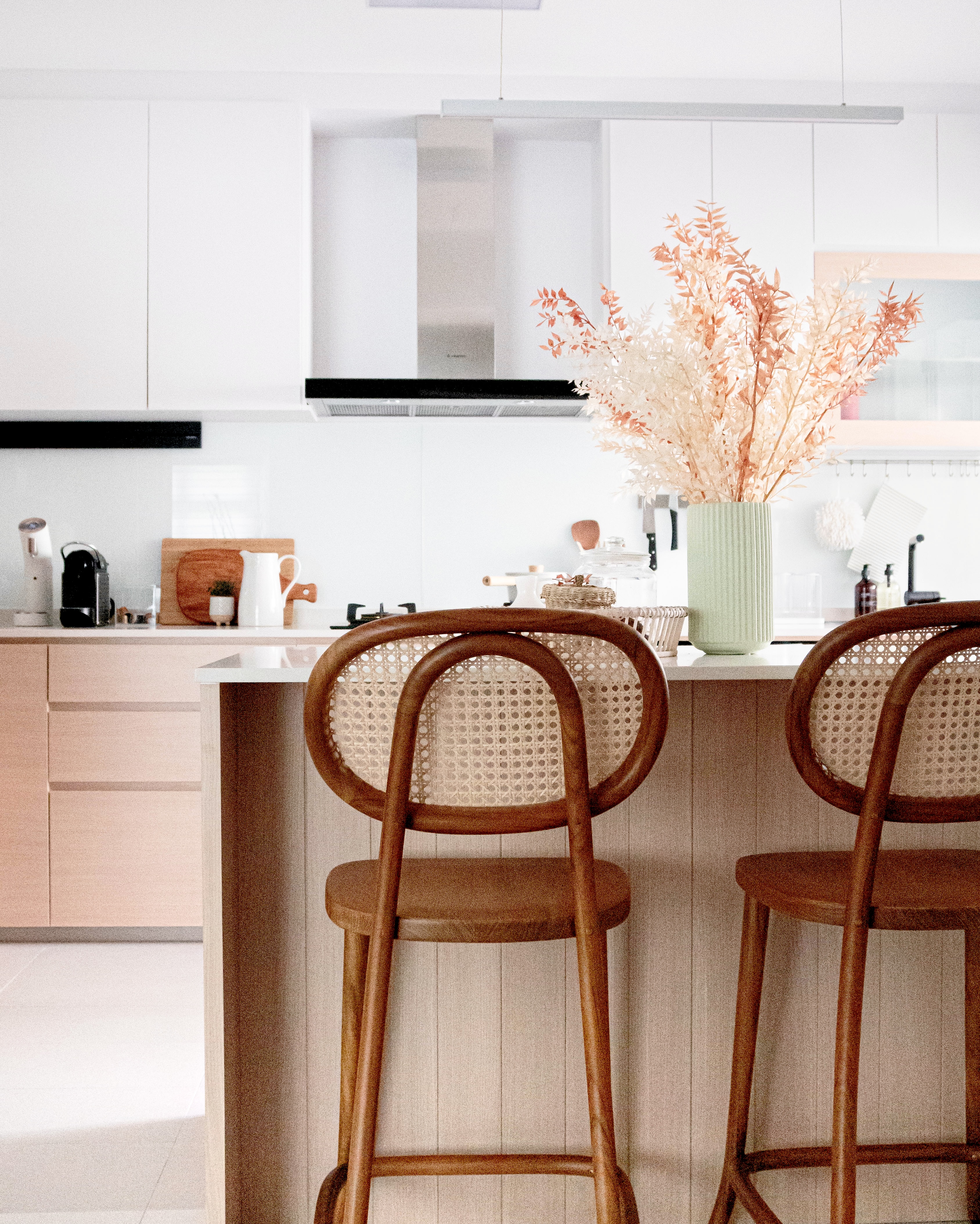 Resort Inspired Living & Dining Space @ GreenFoliage - Modern kitchen with minimalist design, light beige cabinetry, sleek