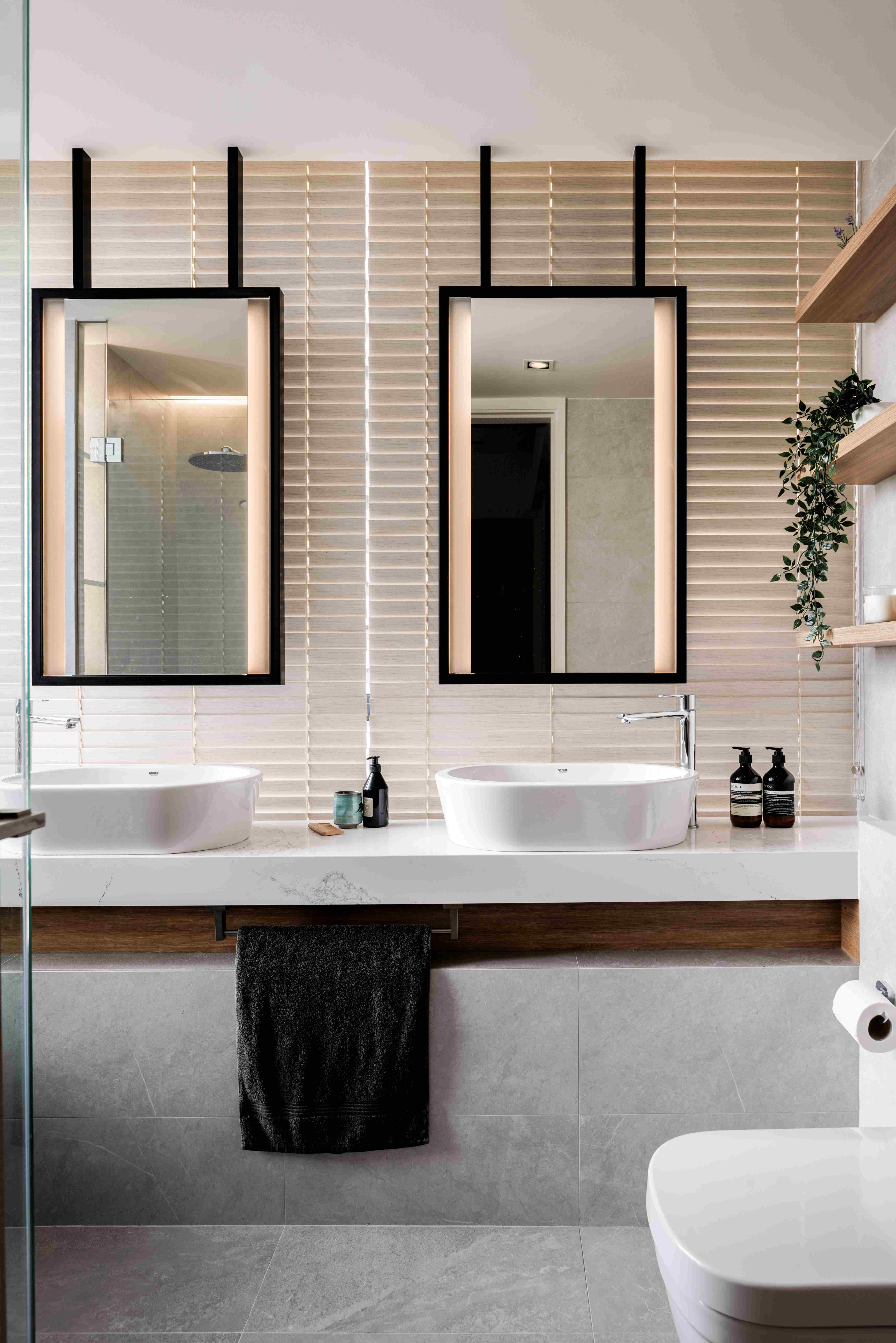 Transforming an old home to emphasise its calmness & warmth - Modern bathroom with sleek design, large mirror, two white