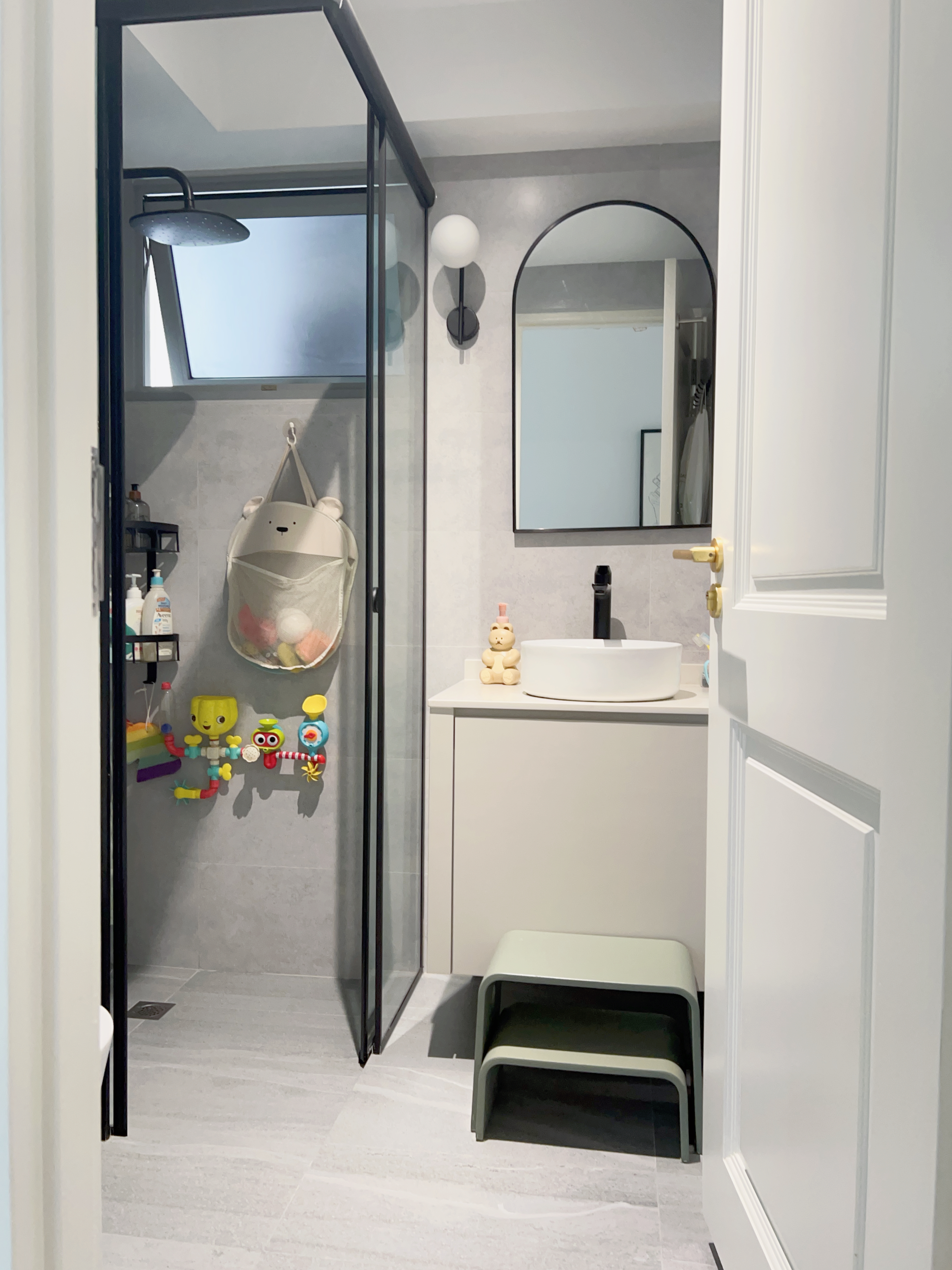 Two Bathrooms, Two Design Concepts! - Modern bathroom with glass shower enclosure, minimalist design, gray tiled walls, white