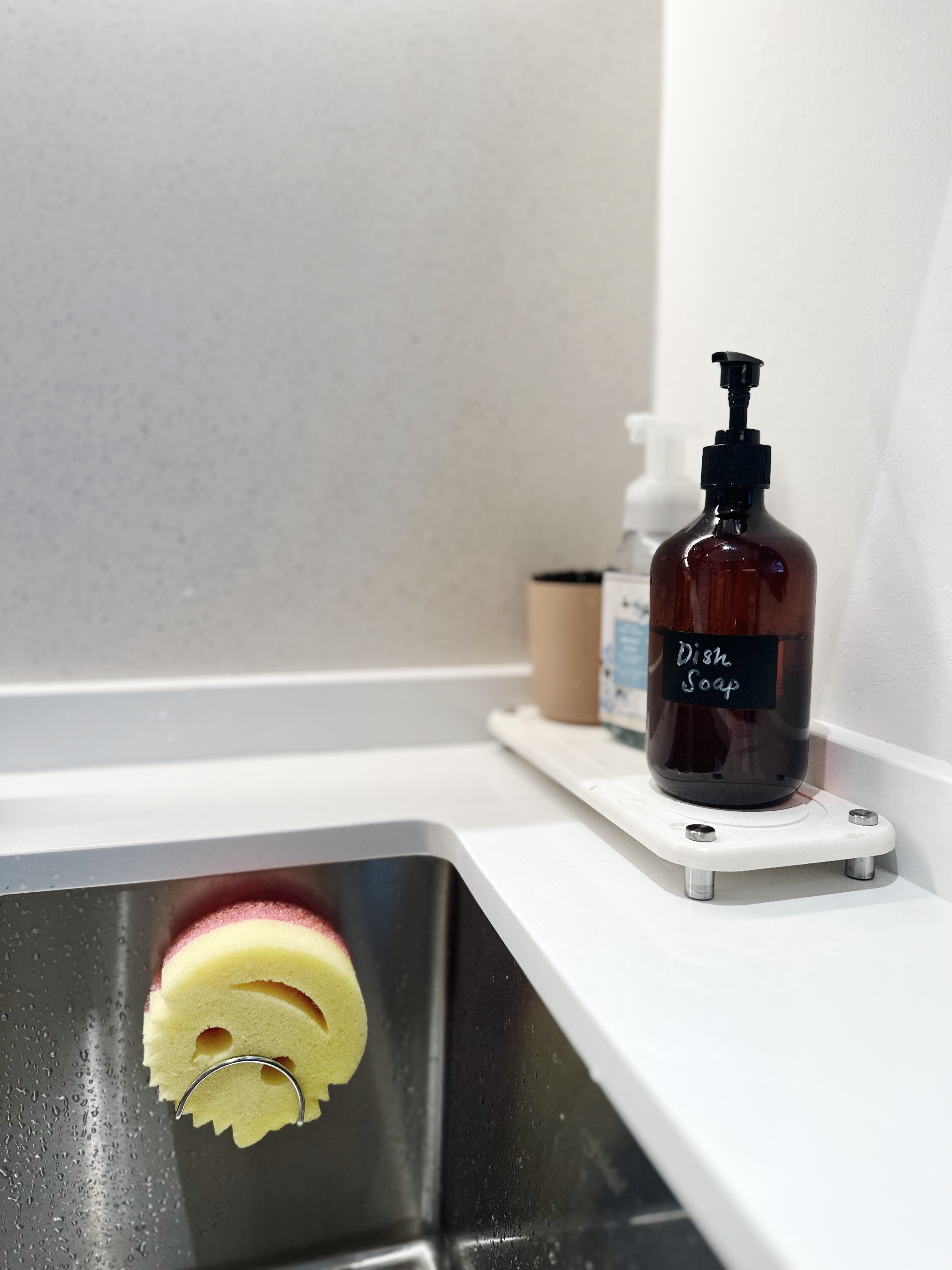 Step inside our kitchen 😋 - Dish soap bottle, white countertop, sink, yellow sponge, dishwashing liquid, soap dispenser