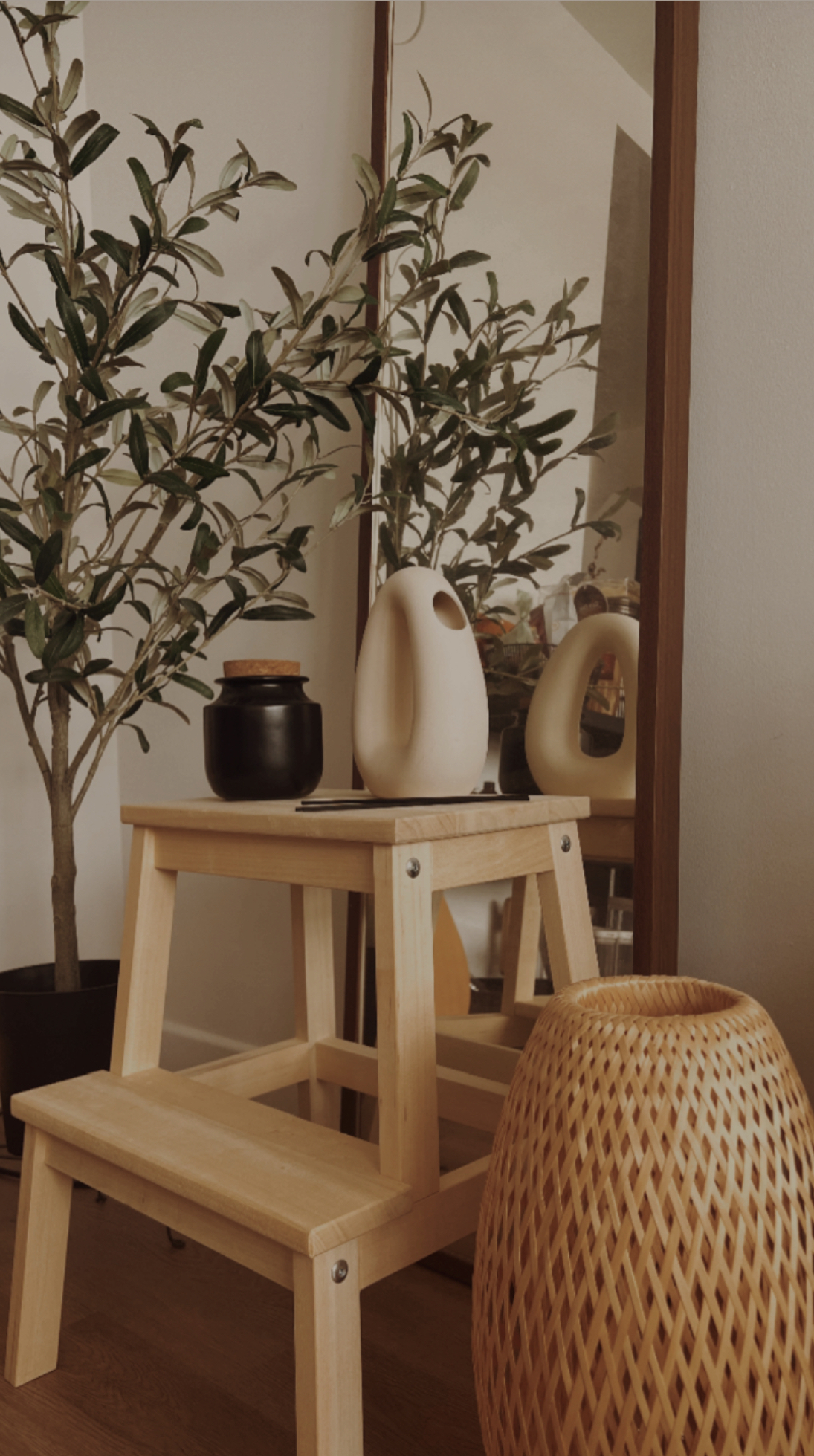 aesthetic must-haves for your japandi home 🍂 - Light wooden table, potted plant, black vase, white vase, woven stool, wooden