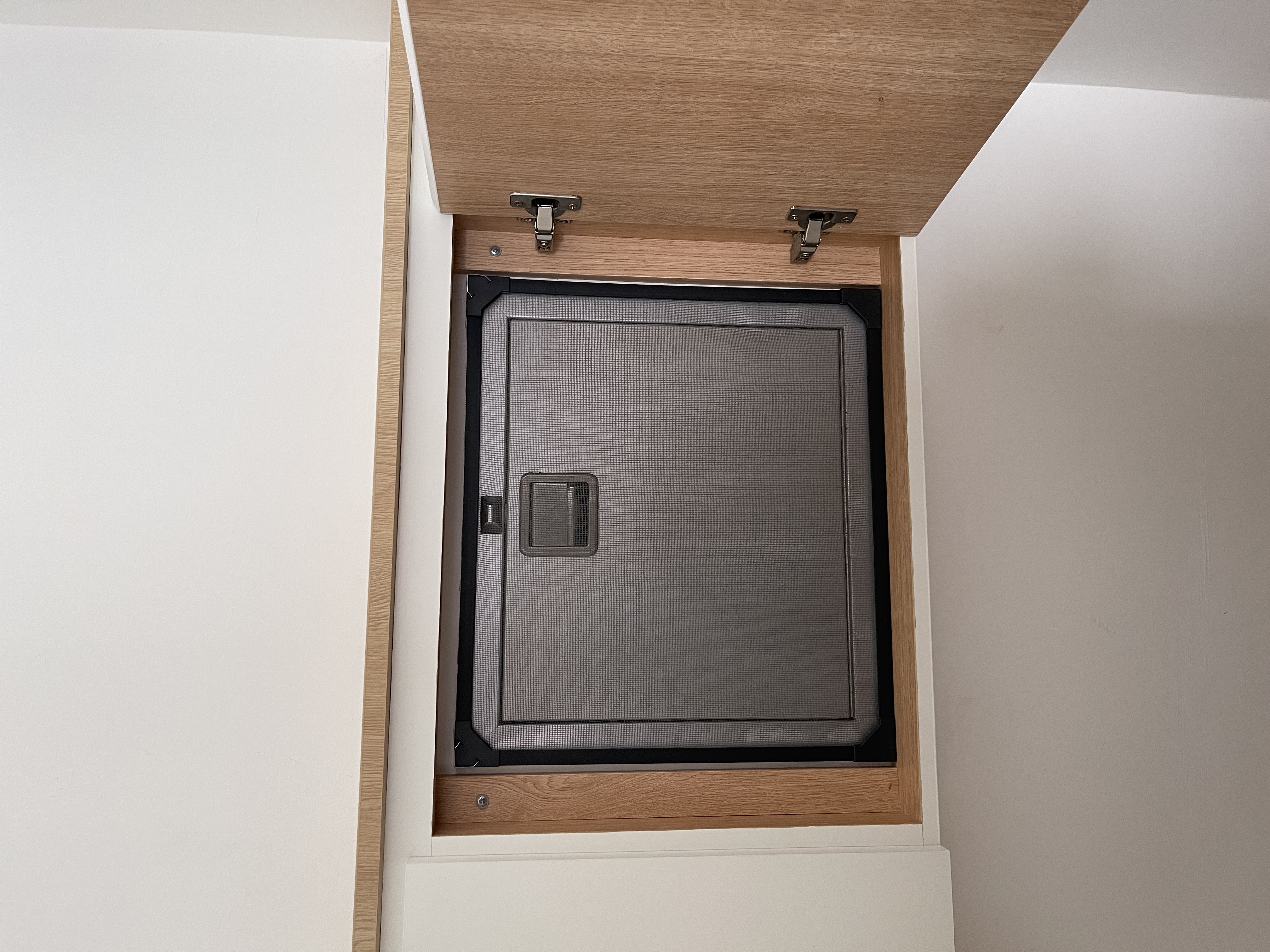 Our Kitchen: Before & After  - Wooden frame, metal latch, vented door, gray mesh, built-in closet, modern design, integrated