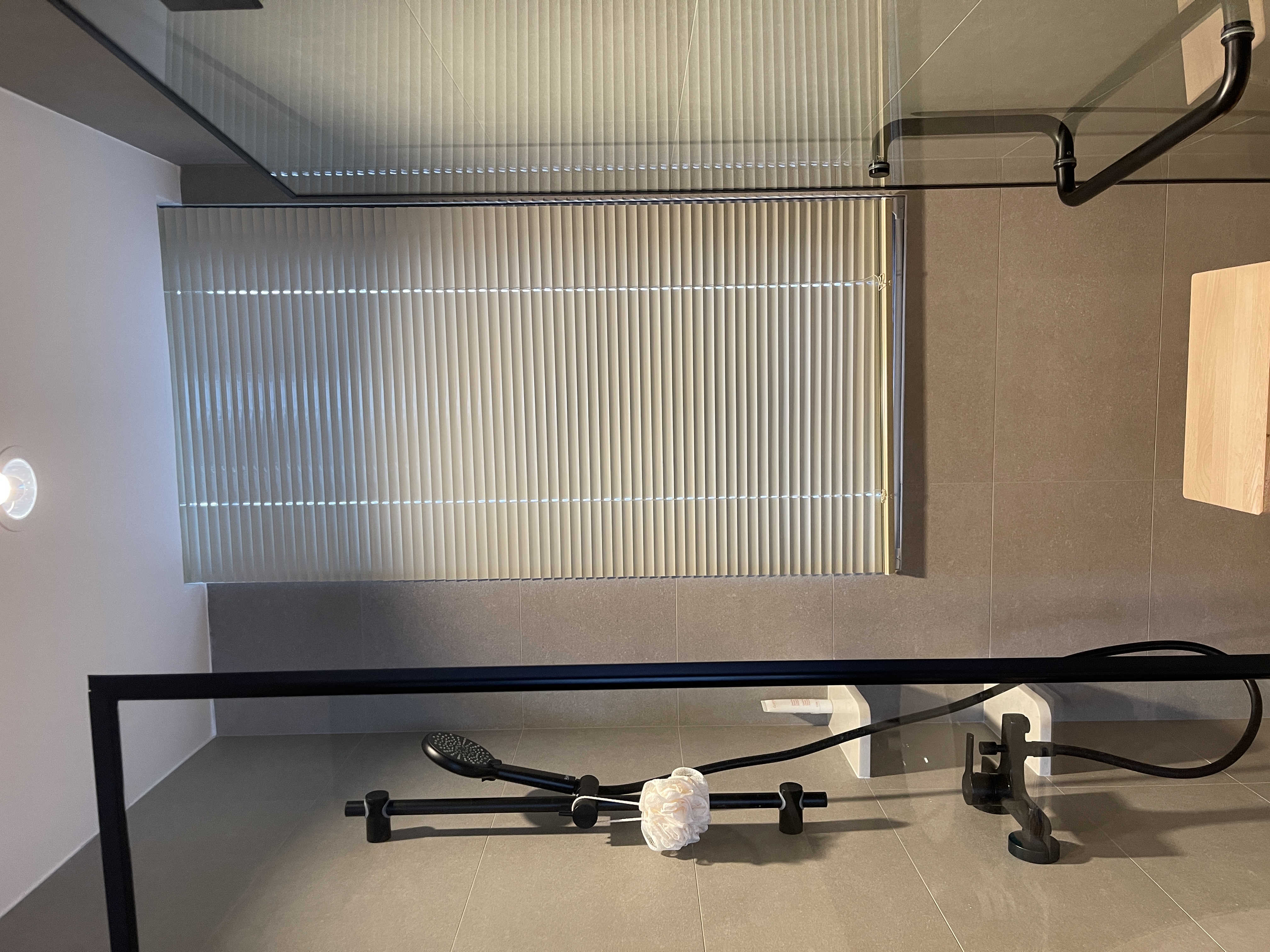 Our Simple & Function Bathrooms: Before & After  - Modern minimalist bathroom, sleek black fixtures, large window with