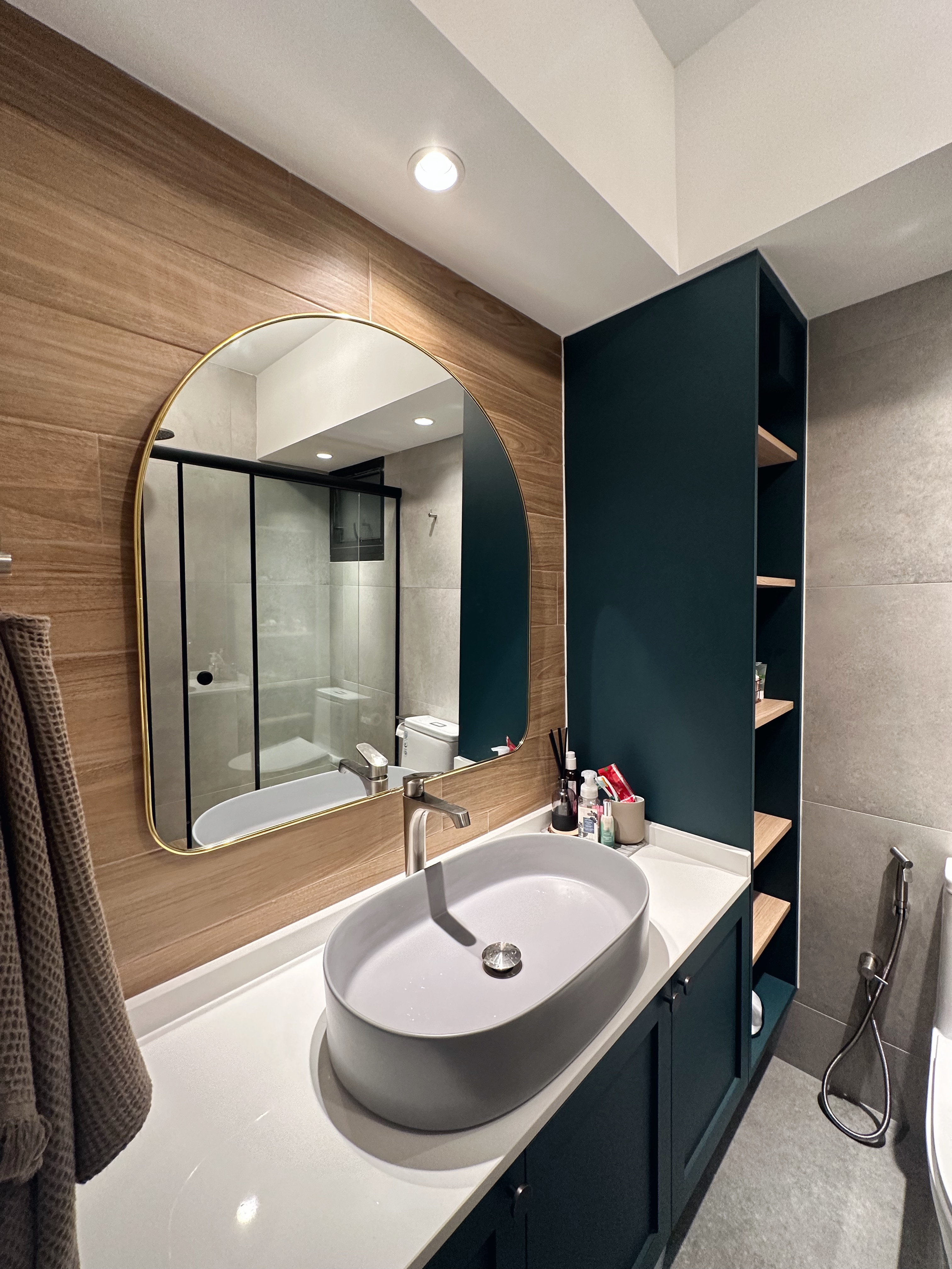 Neutral with a Pop of Colour ✨🧻 - Wooden wall, modern bathroom, oval mirror, floating vanity, white countertop, sleek sink