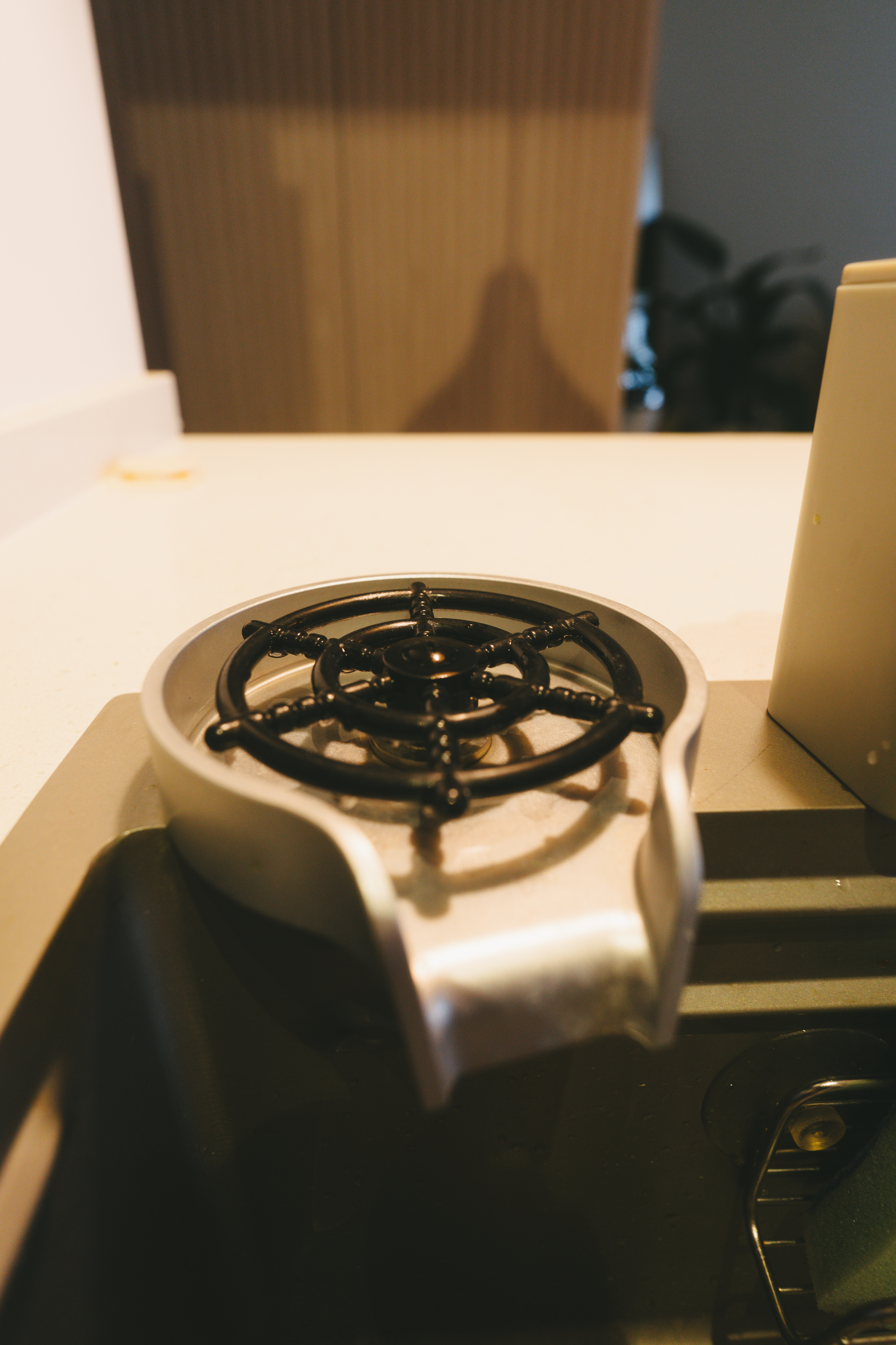 A rather uninspiring kitchen | Thoughts and reflections - Kitchen countertop, stove burner, black stove grate, black stove