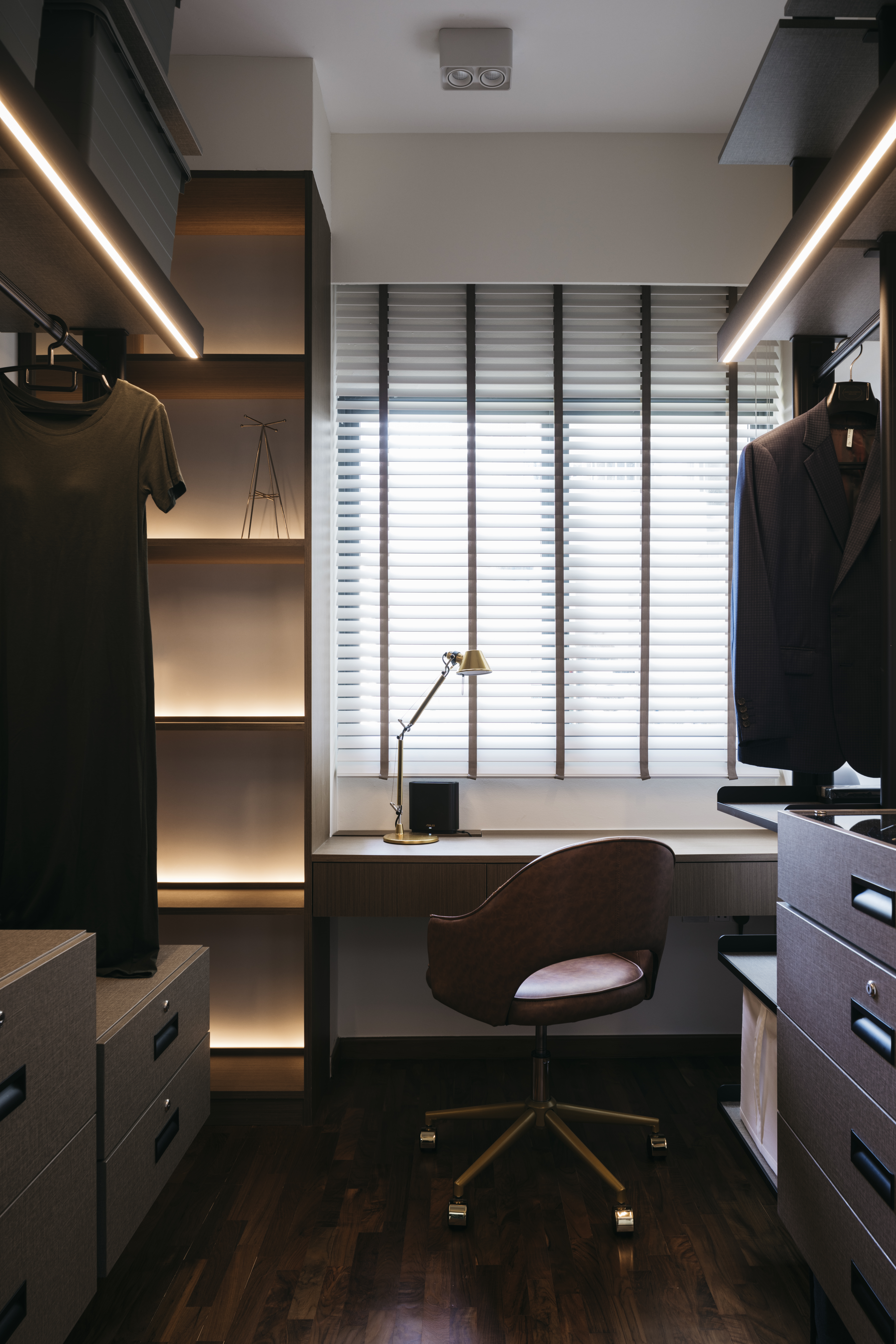 Rochelle: A hint of calmness & elegance - Modern workspace, sleek shelving, illuminated lighting, desk with lamp, mannequin