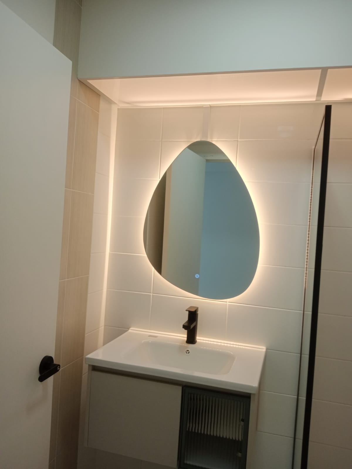 Transforming 2 bathrooms which we didn’t originally budget for - Modern bathroom vanity, sleek design, illuminated mirror