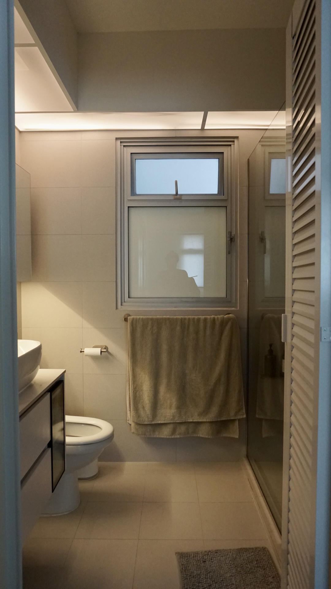 Transforming 2 bathrooms which we didn’t originally budget for - Modern minimalist bathroom, beige tiles, white sink, toilet