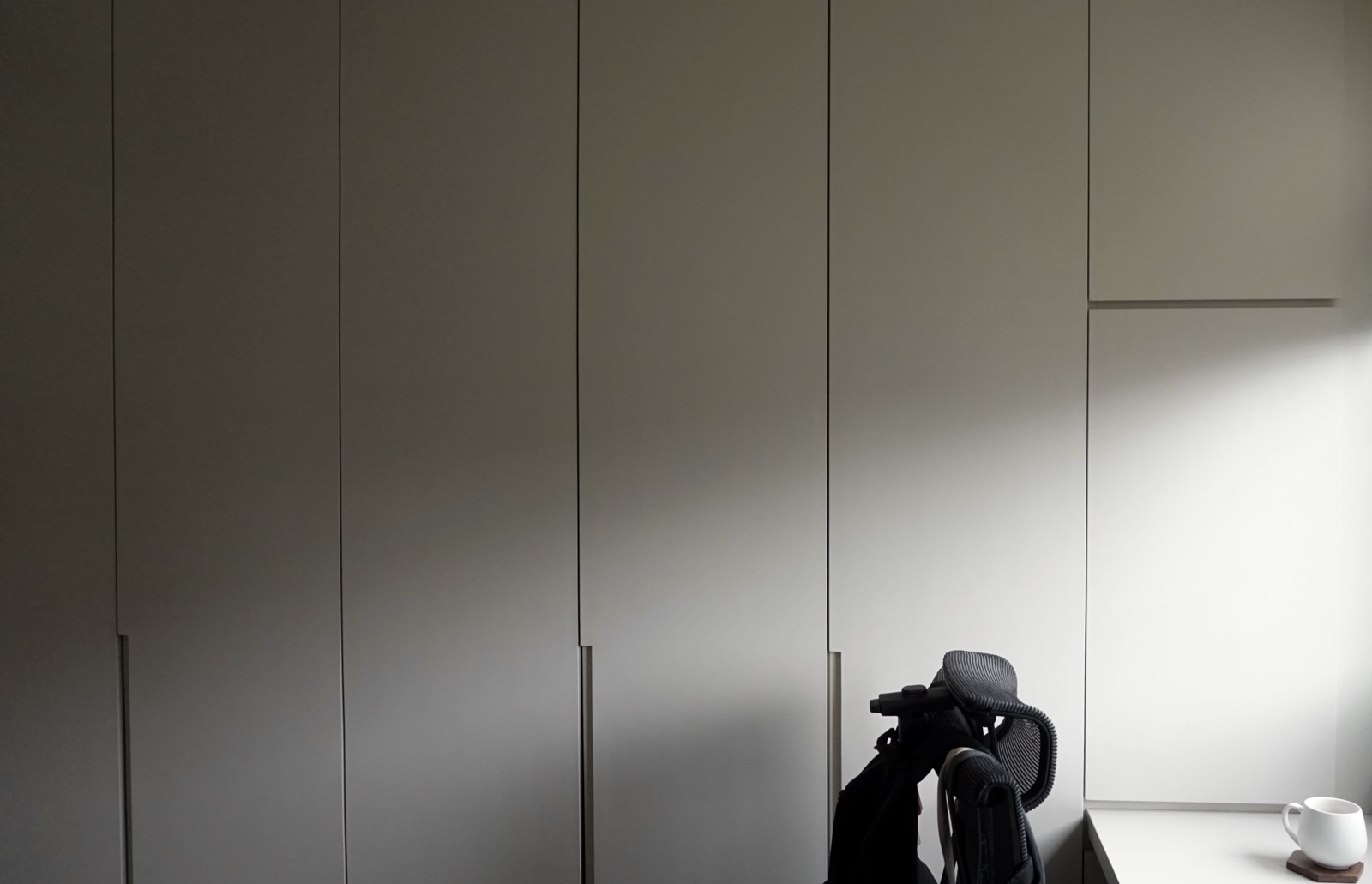 Walk-in wardrobe? Study? Getting ready without disturbing one another - Modern minimalist office space, sleek white cabinets