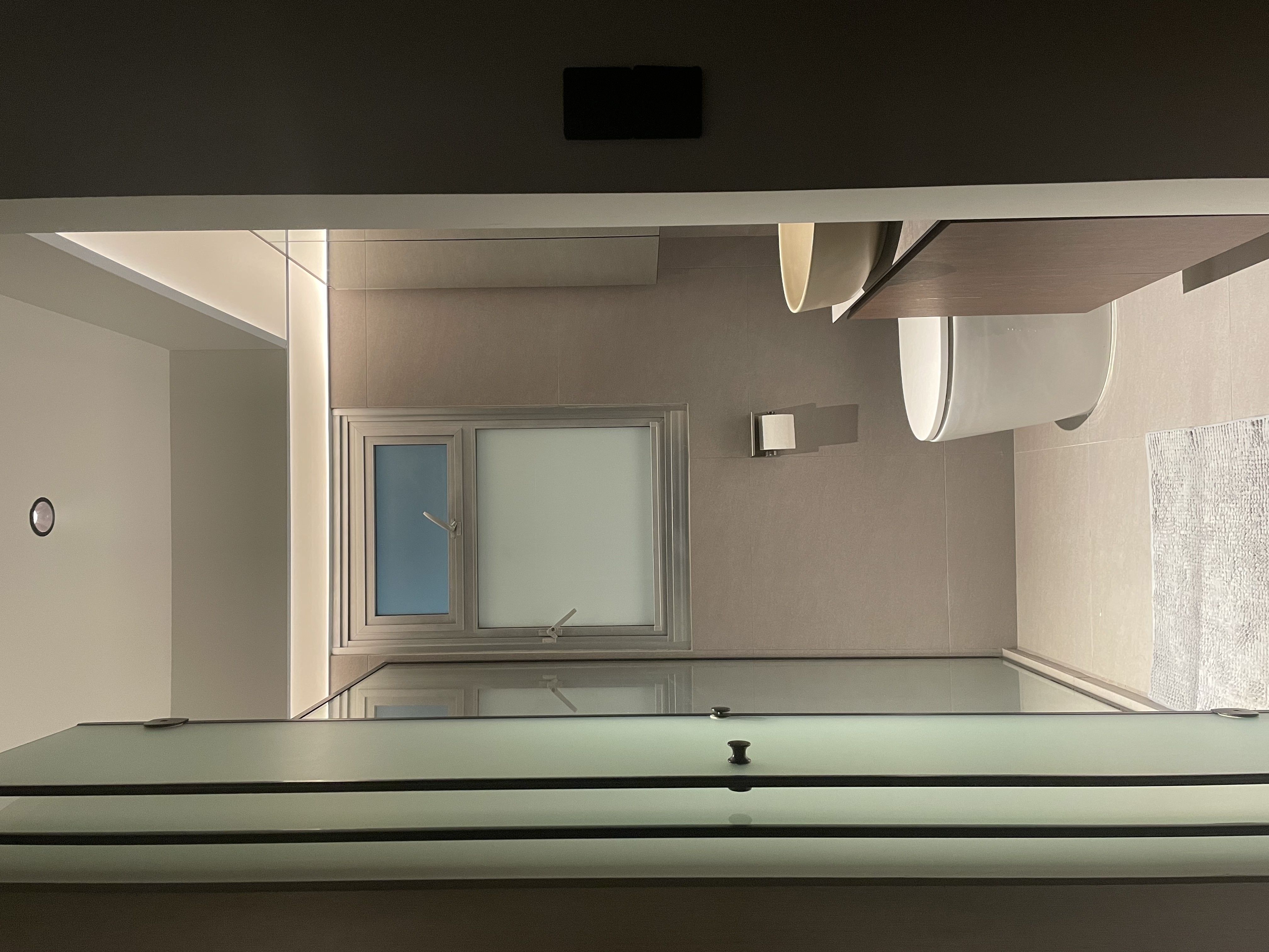 Our masterbedroom toilet: grey ambient, functional and soothing - Modern minimalist bathroom, sleek design, large window