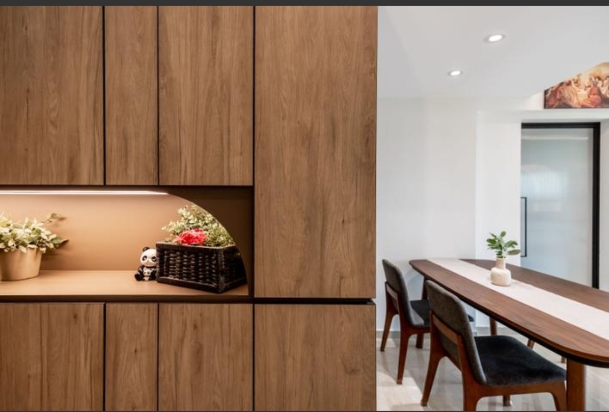 Our guests are greeted by this sight! - Wooden cabinet with built-in shelves, minimalist design, warm lighting, potted